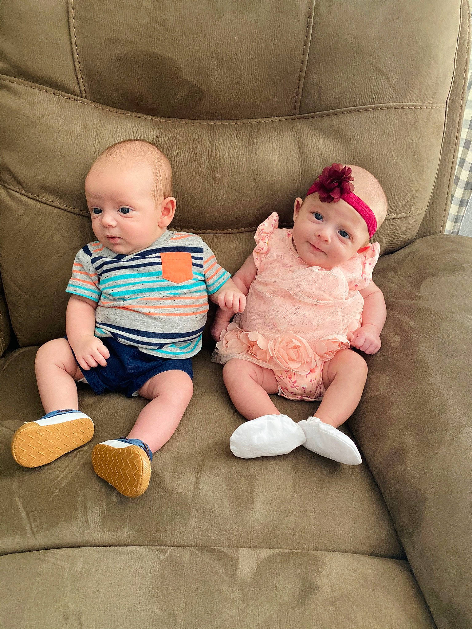 Ansley joined the competition — help win amazing prizes! baby, baby_toddler_clothing, cheek, child, comfort, couch, eye, facial_expression, finger, flooring, foot, head, headwear, leg, person, skin, sleeve, sock, textile, thigh