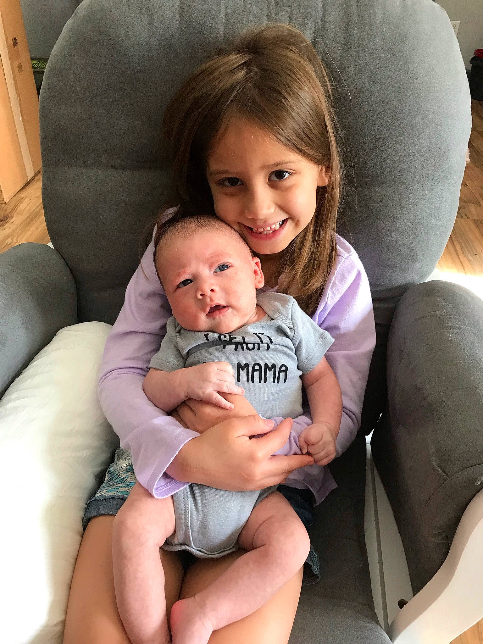 Ivy joined the competition — help win amazing prizes! child, comfort, facial_expression, finger, fun, hair, hairstyle, happy, head, human, interaction, joy, lap, leg, mammal, person, product, skin, smile, thigh