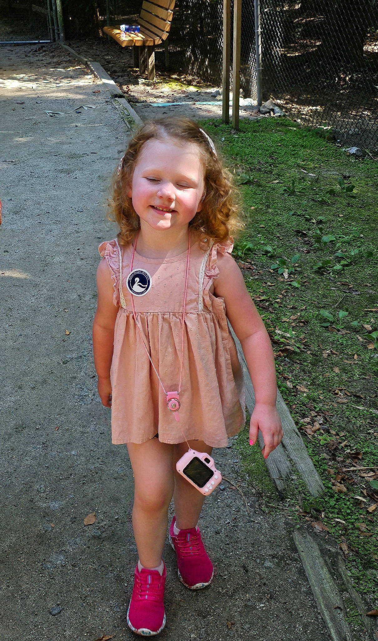 Jaydin is registered to the contest to win money with this photo: asphalt, baby_toddler_clothing, blond, brown_hair, child, clothing, day_dress, dress, eye, grass, hair, happy, head, joy, people_in_nature, person, pink, plant, sleeve, smile
