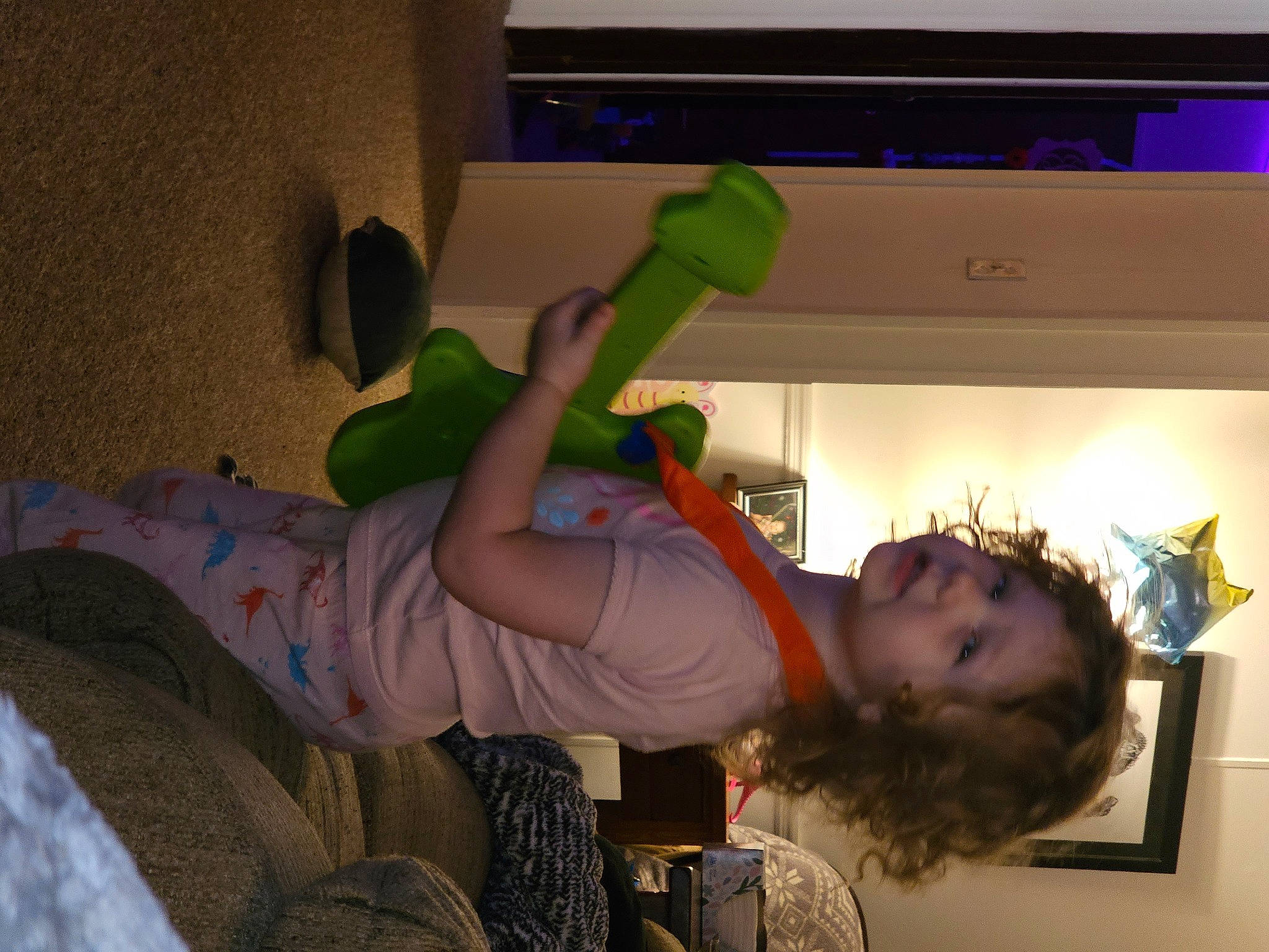 Jaydin is registered to the contest to win money with this photo: child, comfort, elbow, fun, happy, human_leg, knee, party, person, plant, room, smile, sock, t_shirt, thigh, toddler, trunk