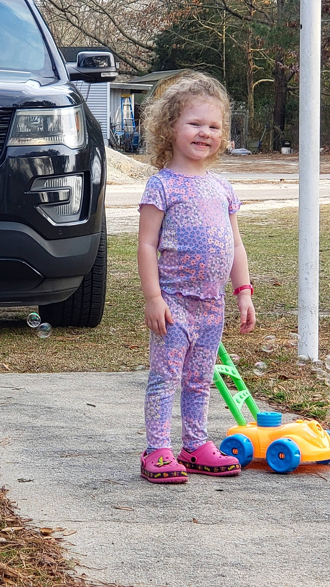 Jaydin joined the competition — help win amazing prizes! asphalt, automotive_exterior, automotive_lighting, automotive_tire, automotive_wheel_system, bumper, car, fender, grass, grille, joy, motor_vehicle, person, personal_luxury_car, rim, smile, tire, toy, tree, vehicle