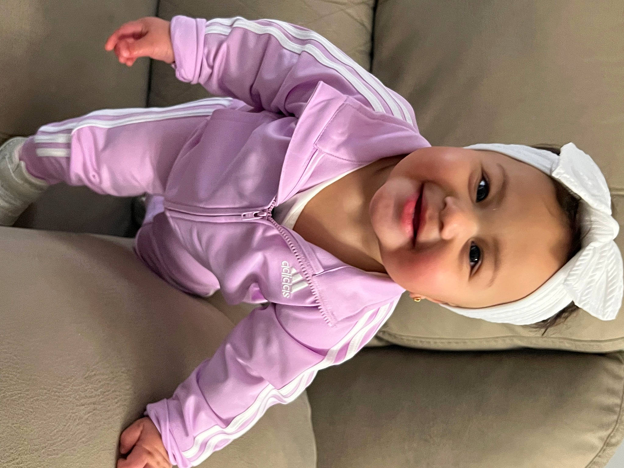 Avah is registered to the contest to win money with this photo: baby, baby_products, baby_toddler_clothing, child, comfort, eyelash, fun, happy, hat, joy, magenta, person, portrait_photography, purple, room, sitting, sleeve, smile, sunglasses, toddler