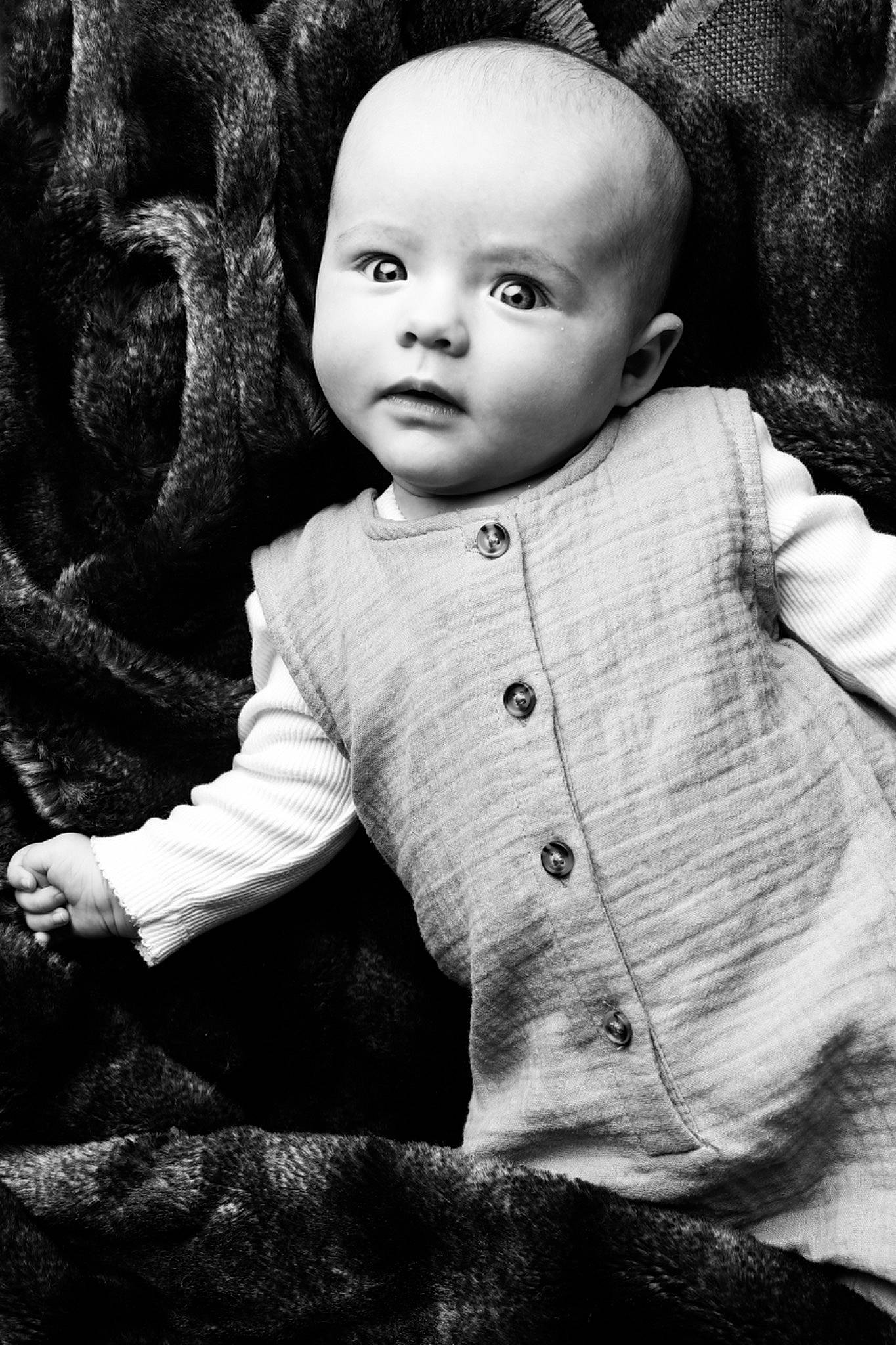 River is registered to the contest to win money with this photo: black, black_and_white, cheek, chin, eye, flash_photography, hairstyle, happy, head, human, human_body, iris, lip, nose, organ, person, photograph, skin, sleeve, standing