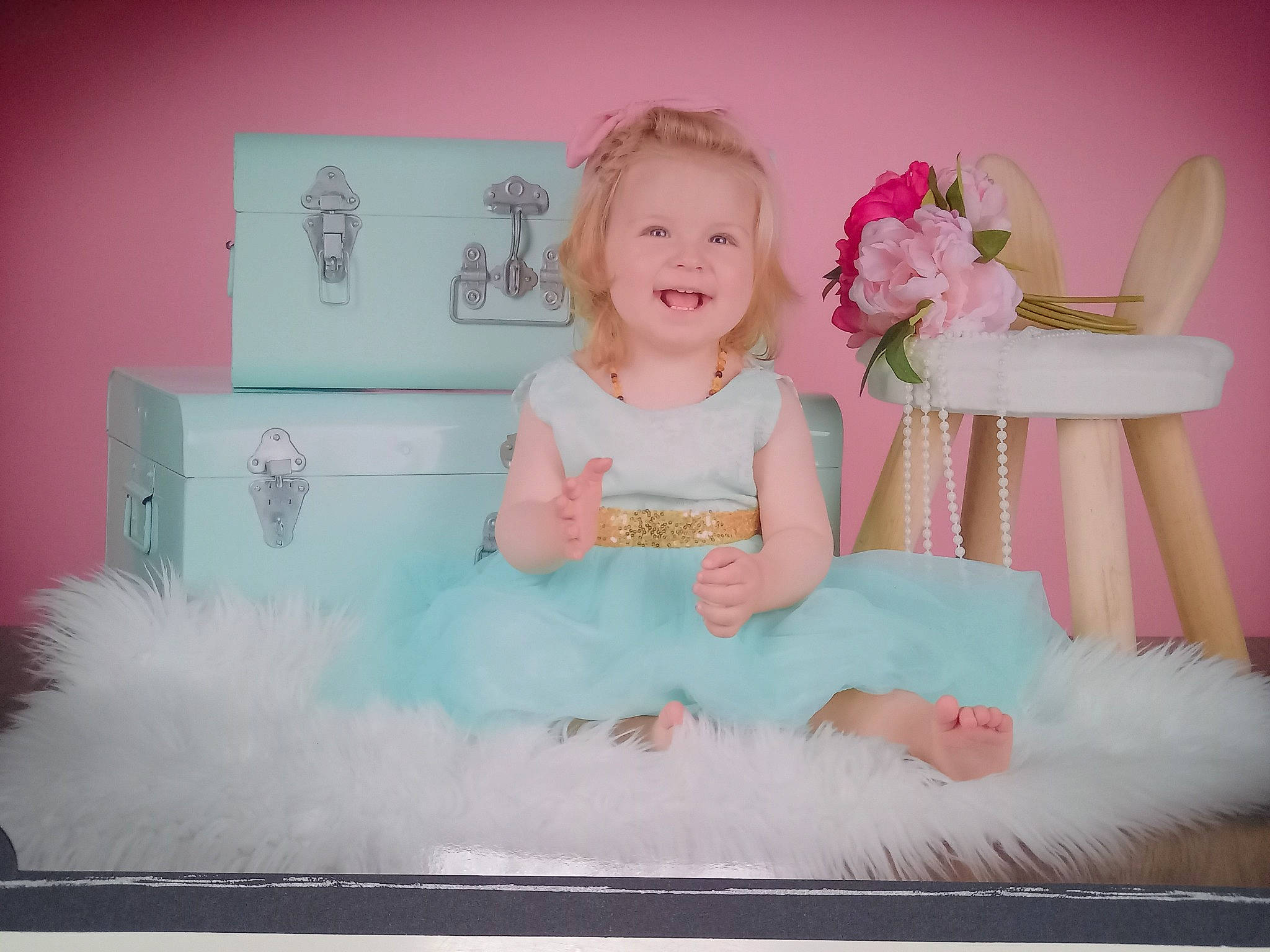 Zélia participe au concours pour gagner de l'argent avec cette photo : baby, baby_toddler_clothing, clothing, dress, embellishment, event, fashion_accessory, flash_photography, fun, happy, headpiece, joy, magenta, person, pink, product, purple, sitting, sleeve, smile