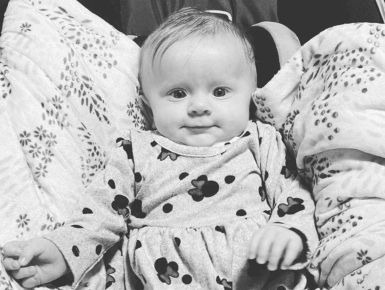 Athena joined the competition — help win amazing prizes! baby, black, black_and_white, cheek, comfort, facial_expression, gesture, hairstyle, happy, human, interaction, mammal, person, photograph, product, skin, sleeve, style, textile, toddler