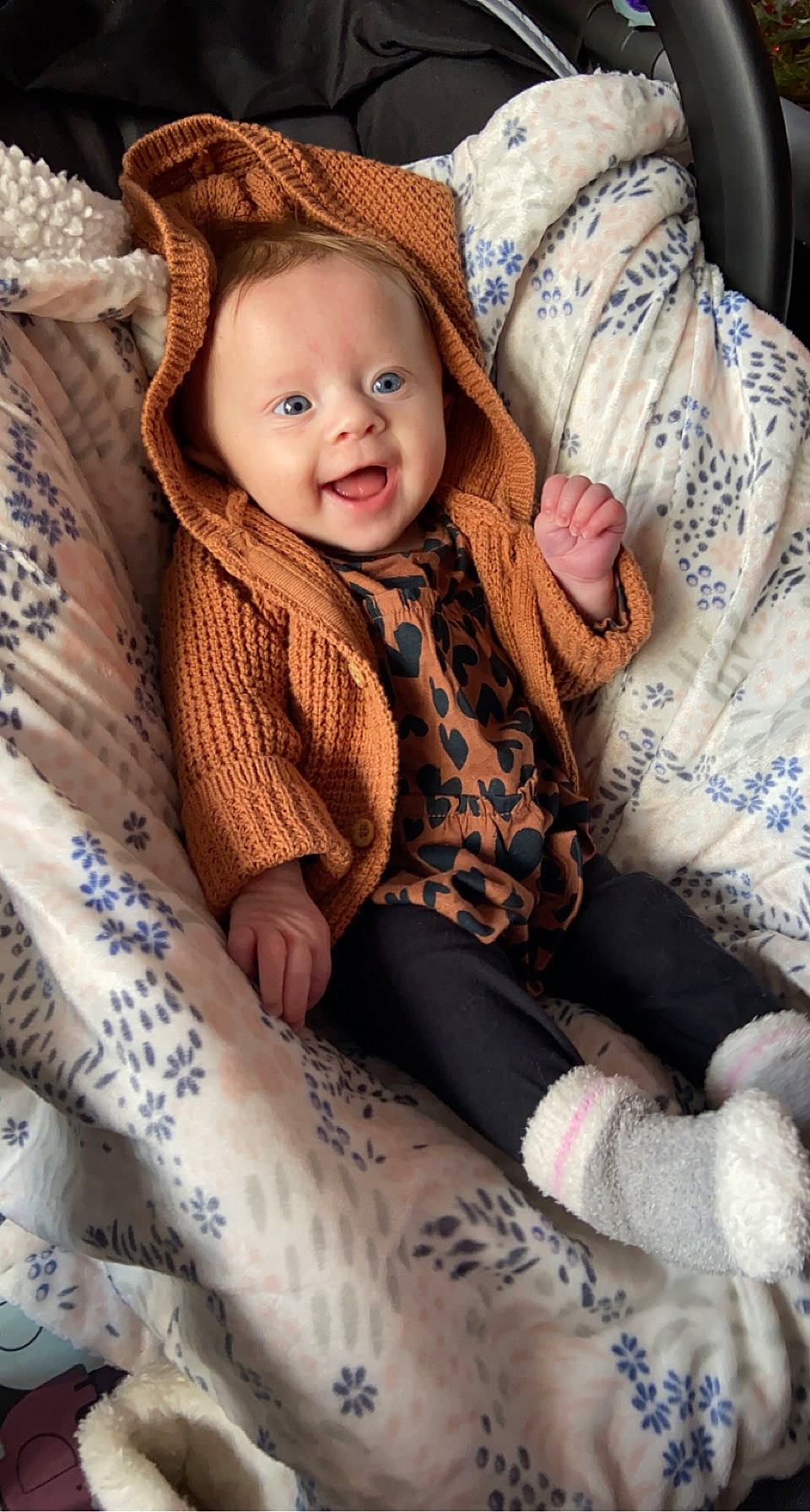 Athena joined the competition — help win amazing prizes! baby, baby_toddler_clothing, child, comfort, face, fashion_accessory, fur, happy, human_leg, knee, linens, outerwear, pattern, person, sitting, skin, sleeve, smile, thigh, toddler