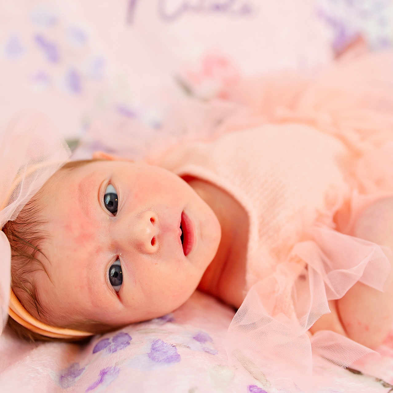 Kensley joined the competition — help win amazing prizes! baby, bodypart, bonnet, clothing, dress, face, finger, hand, happy, hat, head, mouth, newborn, person, photography, portrait, smile