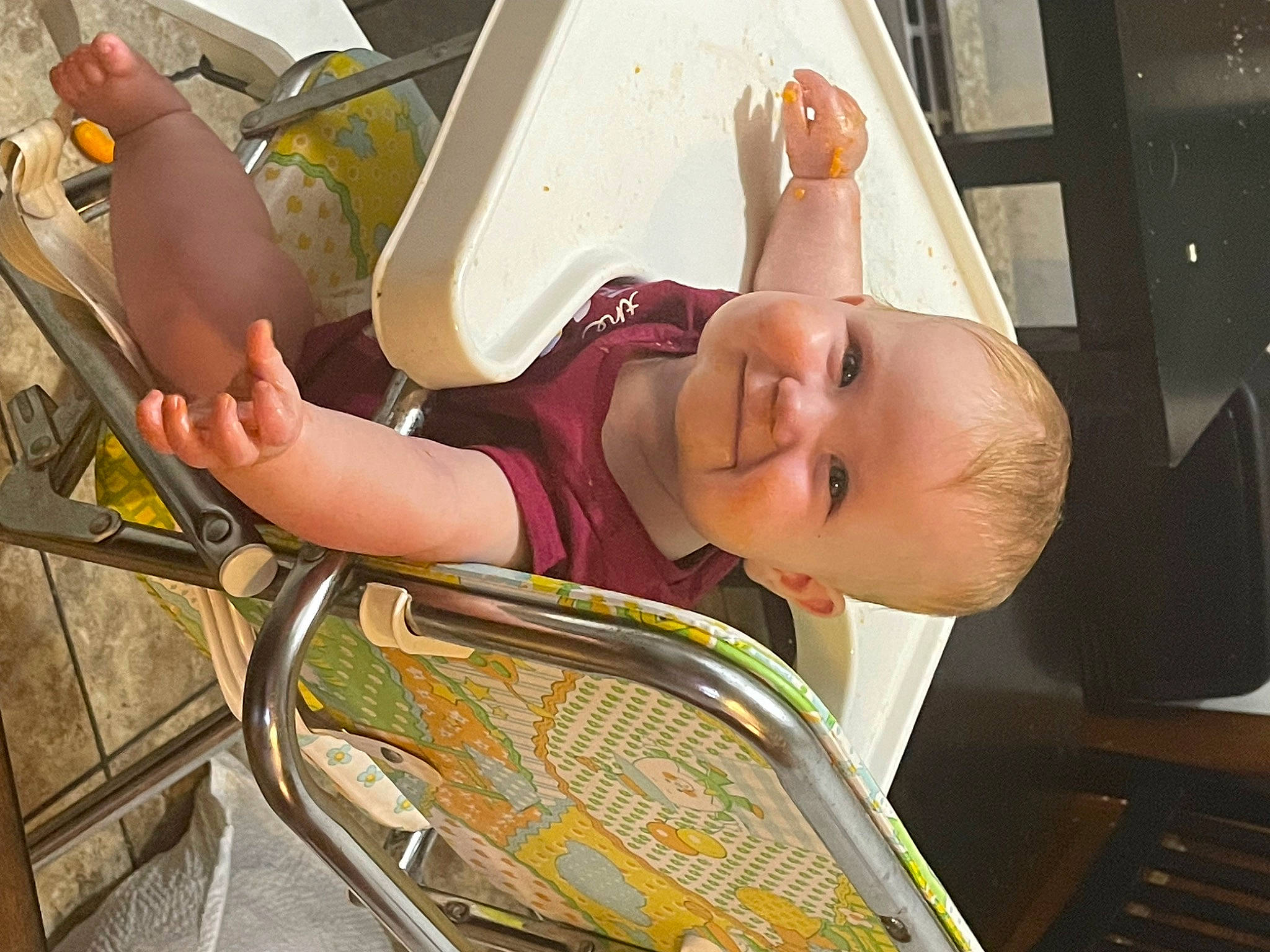 Lynnzie is registered to the contest to win money with this photo: baby, baby_carriage, baby_products, baby_toddler_clothing, chair, chest, child, comfort, eye, finger, fun, head, human_body, joy, leisure, mouth, person, room, sitting, skin