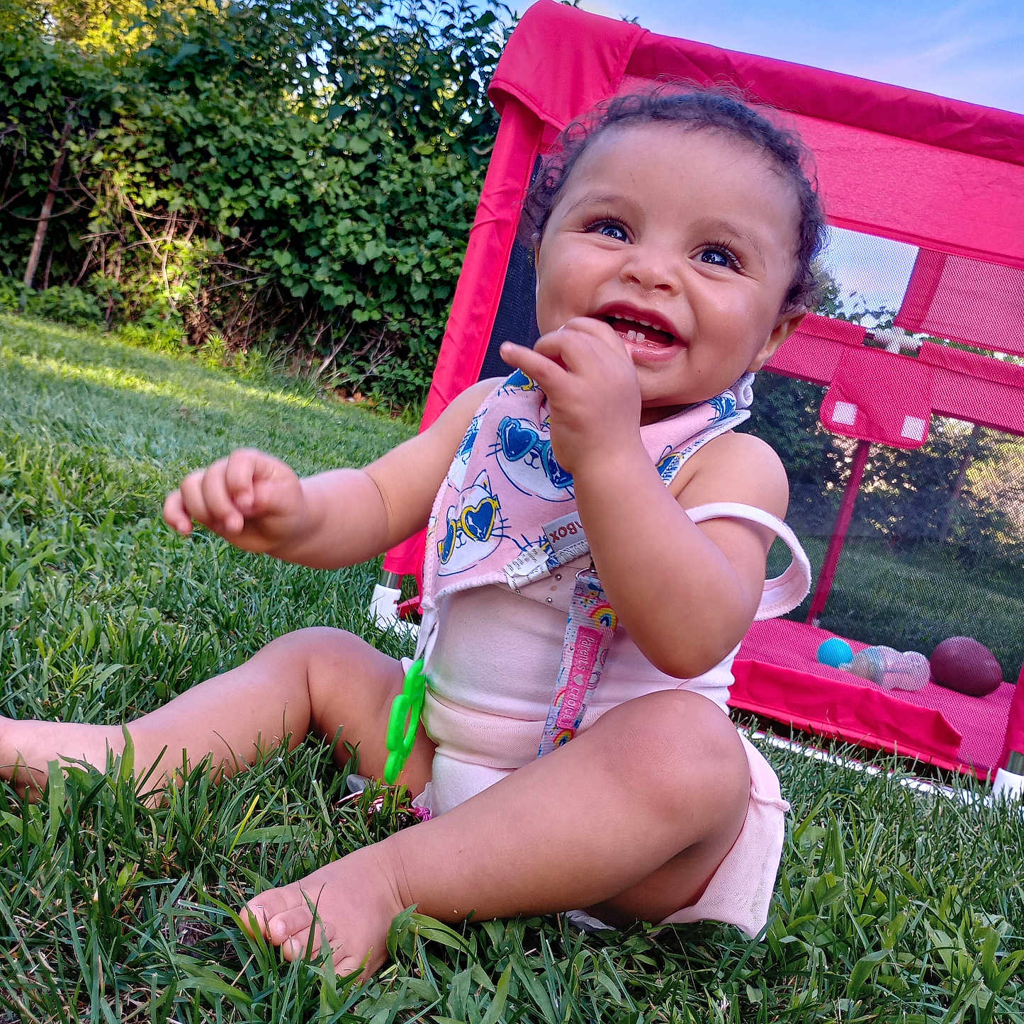 Maileanna is registered to the contest to win money with this photo: baby, backyard, bodypart, clothing, face, finger, grass, head, lawn, nature, outdoors, park, person, photography, plant, portrait, shorts, sitting, summer, yard