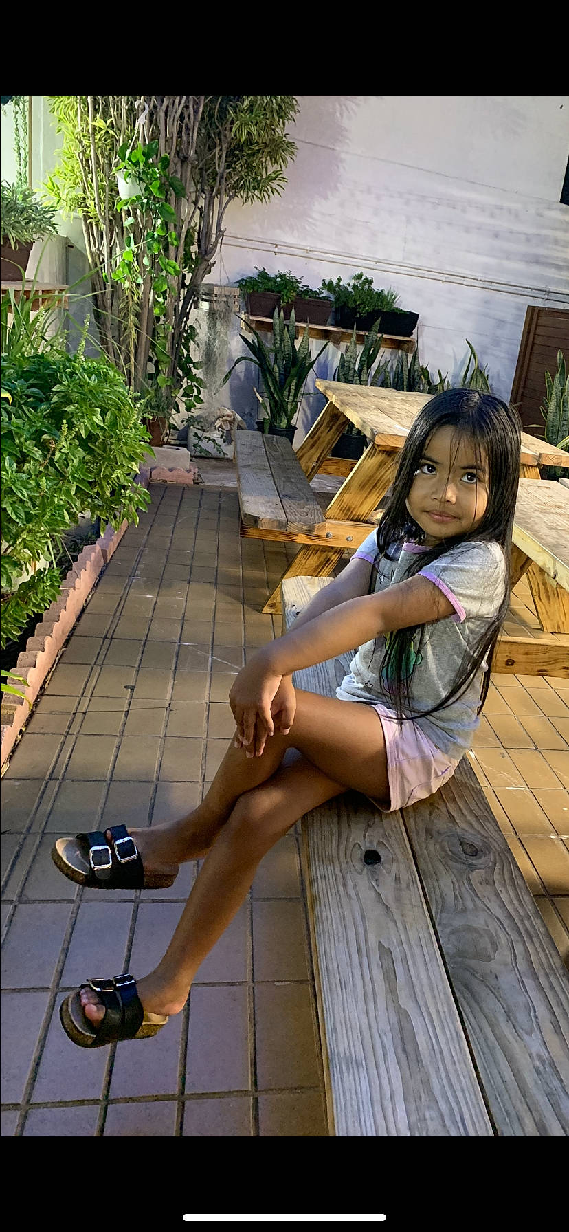 Kyleen Bolosan joined the competition — help win amazing prizes! black_hair, calf, flooring, foot, fun, grass, happy, hardwood, human_leg, knee, leg, leisure, person, plant, sandal, shoe, sitting, sneakers, thigh, vacation