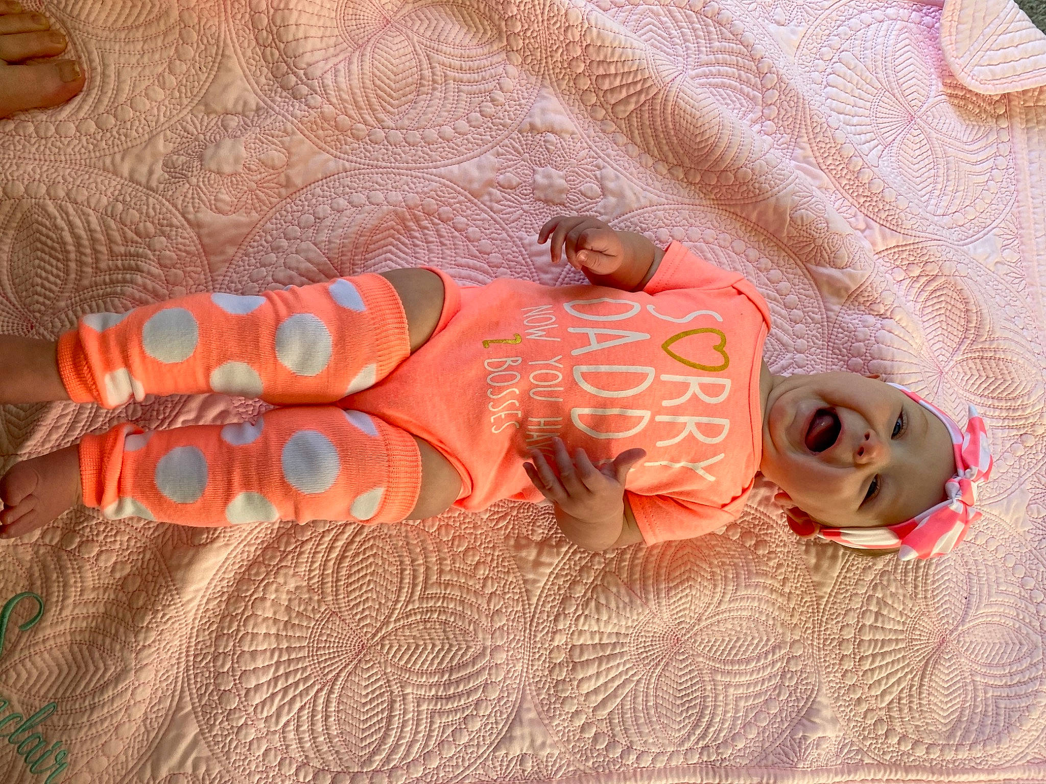 Michaela joined the competition — help win amazing prizes! baby_toddler_clothing, carmine, comfort, electric_blue, fawn, finger, foot, headwear, human_leg, knee, linens, nail, orange, pattern, peach, person, skin, sleeve, textile, vertebrate