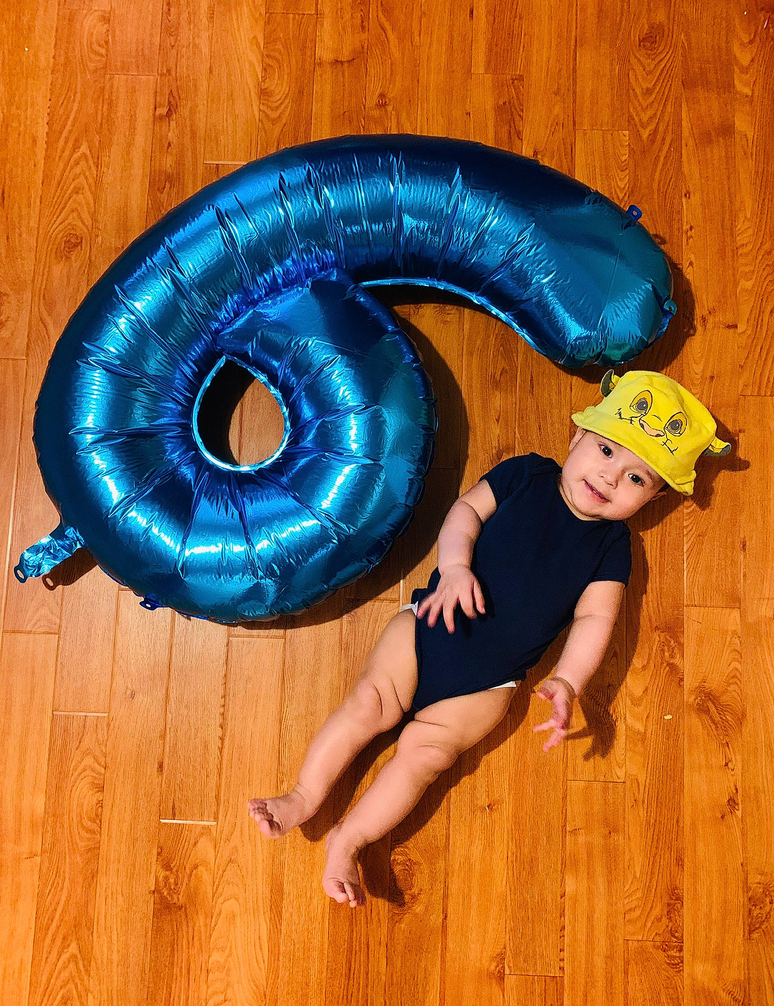 Gustavo joined the competition — help win amazing prizes! automotive_tire, baby_toddler_clothing, blue, child, circle, electric_blue, fashion_accessory, flooring, fun, happy, hardwood, headwear, joy, party_supply, pattern, person, personal_protective_equipment, recreation, t_shirt, thigh