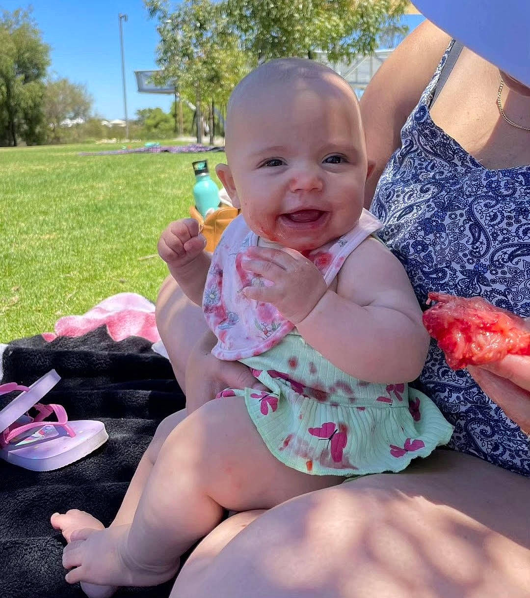 Ivy joined the competition — help win amazing prizes! baby, baby_toddler_clothing, finger, fun, gesture, grass, happy, lap, leg, leisure, mouth, muscle, person, pink, skin, sky, smile, thigh, thumb, toddler