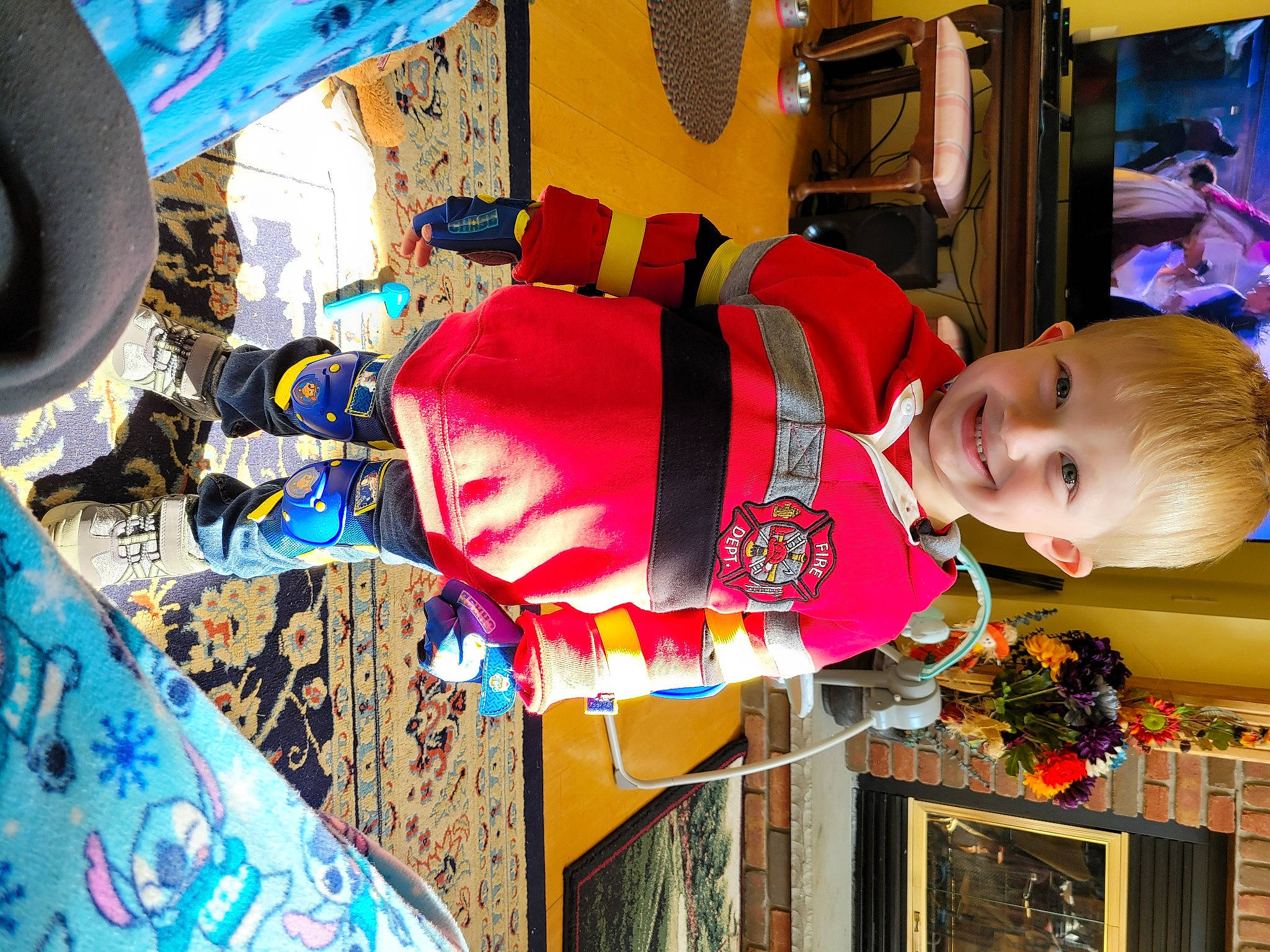 Carter joined the competition — help win amazing prizes! blue, child, costume, event, fictional_character, fun, happy, holiday, joy, kindergarten, leisure, person, play, recreation, red, room, smile, toddler, tree, visual_arts