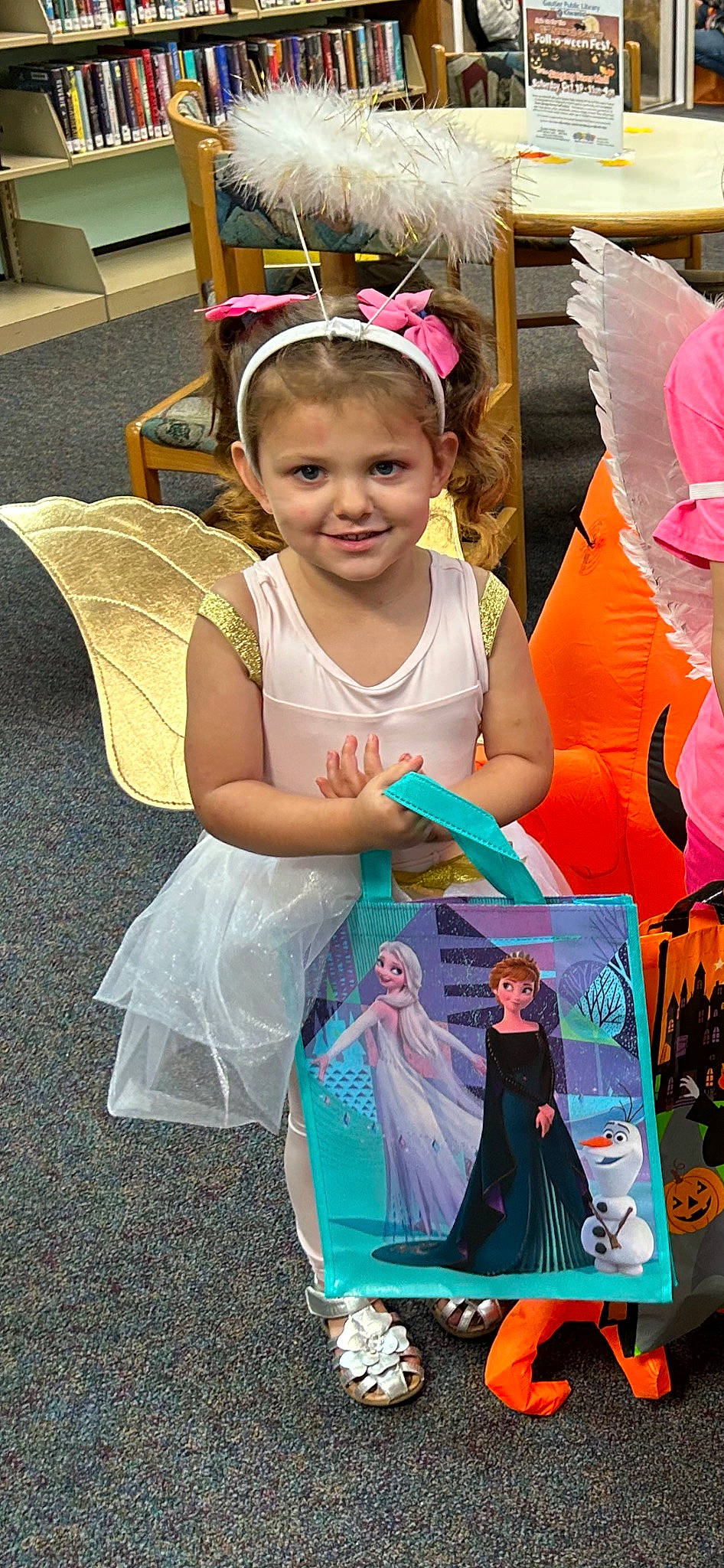 Hayleigh is registered to the contest to win money with this photo: beauty, child, costume, event, fashion, fashion_accessory, fun, happy, headpiece, jewellery, joy, leisure, magenta, mythical_creature, necklace, person, photograph, pink, product, smile