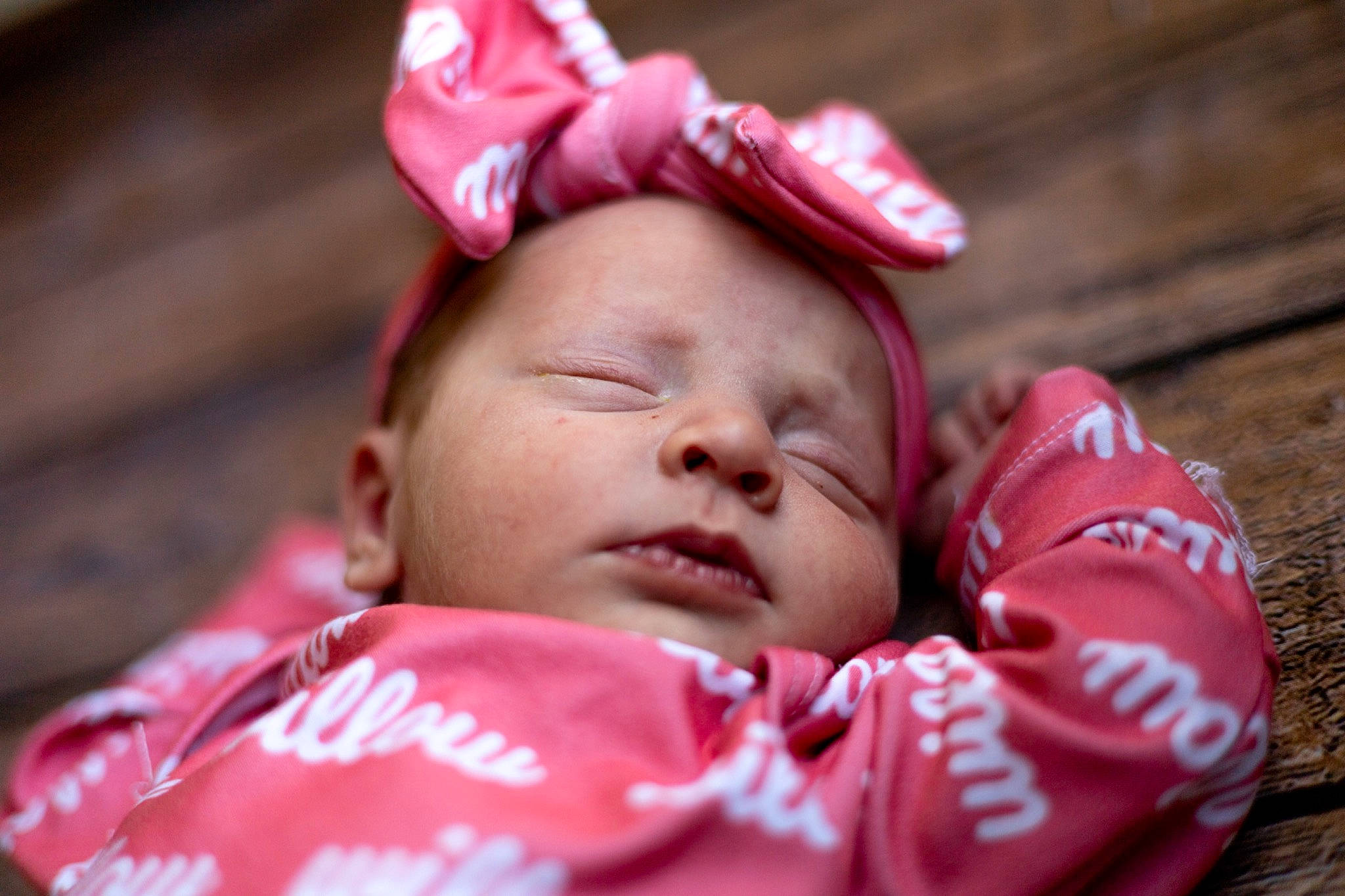 Willow is registered to the contest to win money with this photo: baby, cheek, chin, comfort, eye, eyelash, face, finger, happy, head, headgear, lip, mammal, mouth, nose, person, pink, red, skin, smile