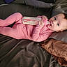 Avianna joined the competition — help win amazing prizes! baby, bed, bottle, child, comfort, cozy, cute, face, feeding, hands, indoors, infant, lying_down, milk, person, pillow, pink_onesie, relaxation, sleepwear, young_child