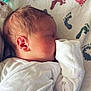 Rylan joined the competition — help win amazing prizes! baby, blanket, child, cozy, cute, footprint_pattern, indoor, infant, mittens, newborn, peaceful, portrait, resting, side_profile, sleeping, soft_lighting, toddler, warm, white_clothing, young