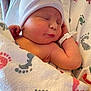 Rylan is registered to the contest to win money with this photo: baby, blanket, child, closeup, cozy, cute, footprint_pattern, hat, hospital, hospital_id, infant, newborn, peaceful, person, portrait, resting, skin, sleeping, soft, wrapped