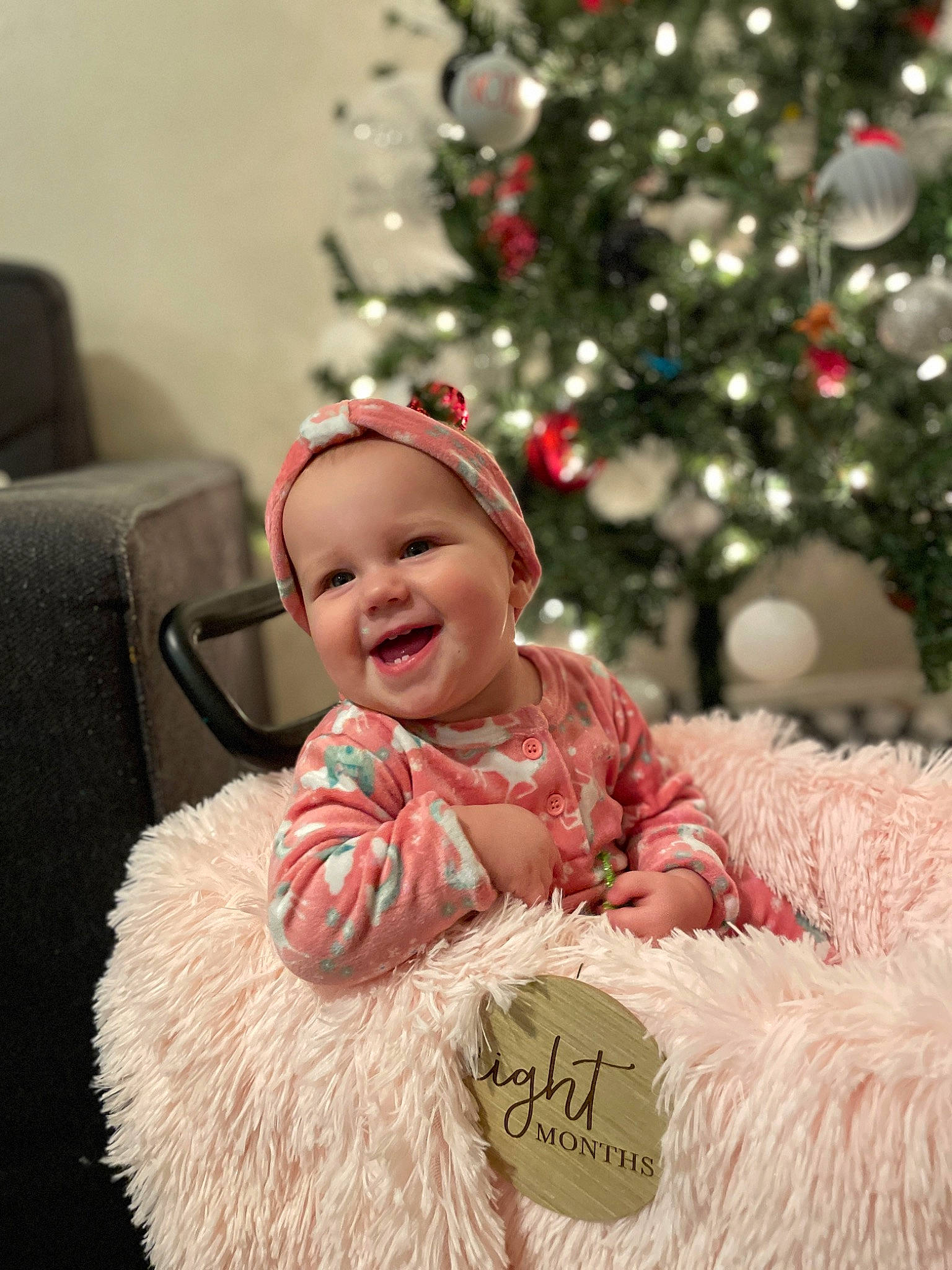 Breleigh joined the competition — help win amazing prizes! baby, baby_toddler_clothing, child, christmas, christmas_decoration, christmas_ornament, christmas_tree, conifer, event, fur, happy, headwear, holiday, joy, ornament, person, red, smile, toddler, tradition