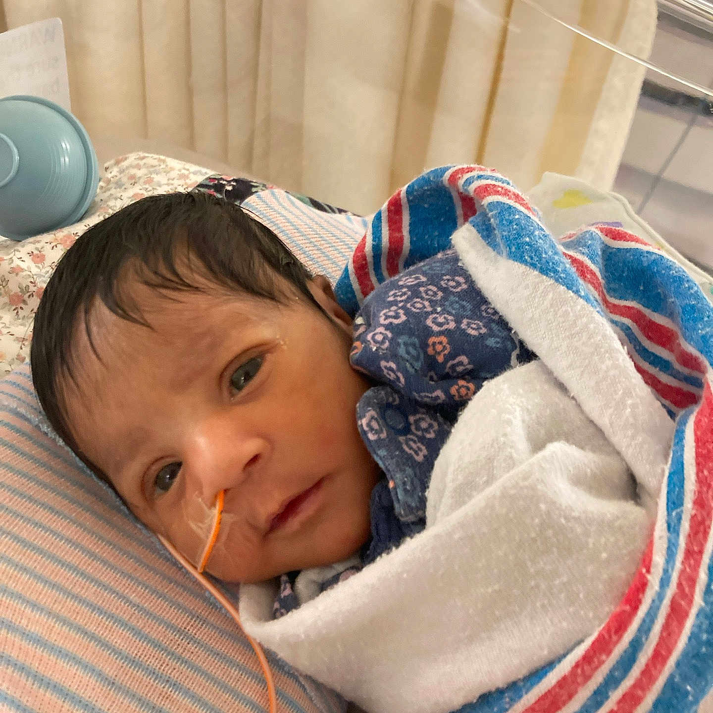 Sumayya joined the competition — help win amazing prizes! baby, bed, blanket, child, close-up, cute, face, feeding_tube, healthcare, hospital, indoors, infant, medical, newborn, patient, pillow, portrait, resting, soft, wrapped