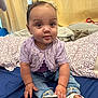 Milayshka is registered to the contest to win money with this photo: baby, child, infant, sitting, clothing, jeans, top, shoe, hand, face, eyes, curly_hair, bed, blanket, pillow, indoor, curtains, cute, portrait, home