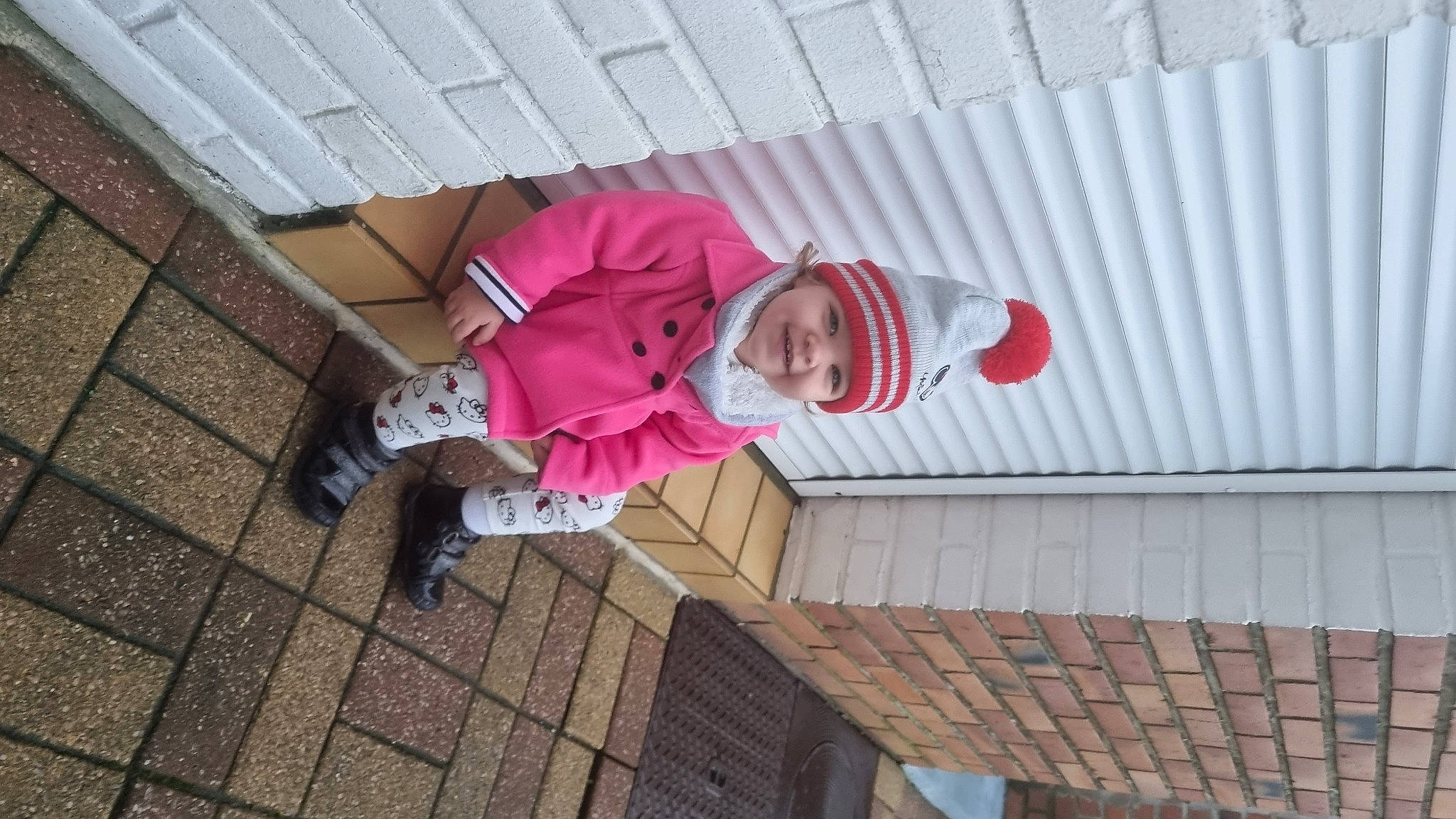 Lana participe au concours pour gagner de l'argent avec cette photo : baby, baby_products, baby_toddler_clothing, carmine, child, flooring, fun, happy, hat, headwear, joy, magenta, pattern, person, pink, siding, smile, toddler, tree, winter
