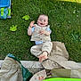 toddler, child, grass, outdoor, toy, truck, paper, green, happy, smiling, barefoot, clothing, play, summer, sunlight, nature, hand, foot, garden, daytime