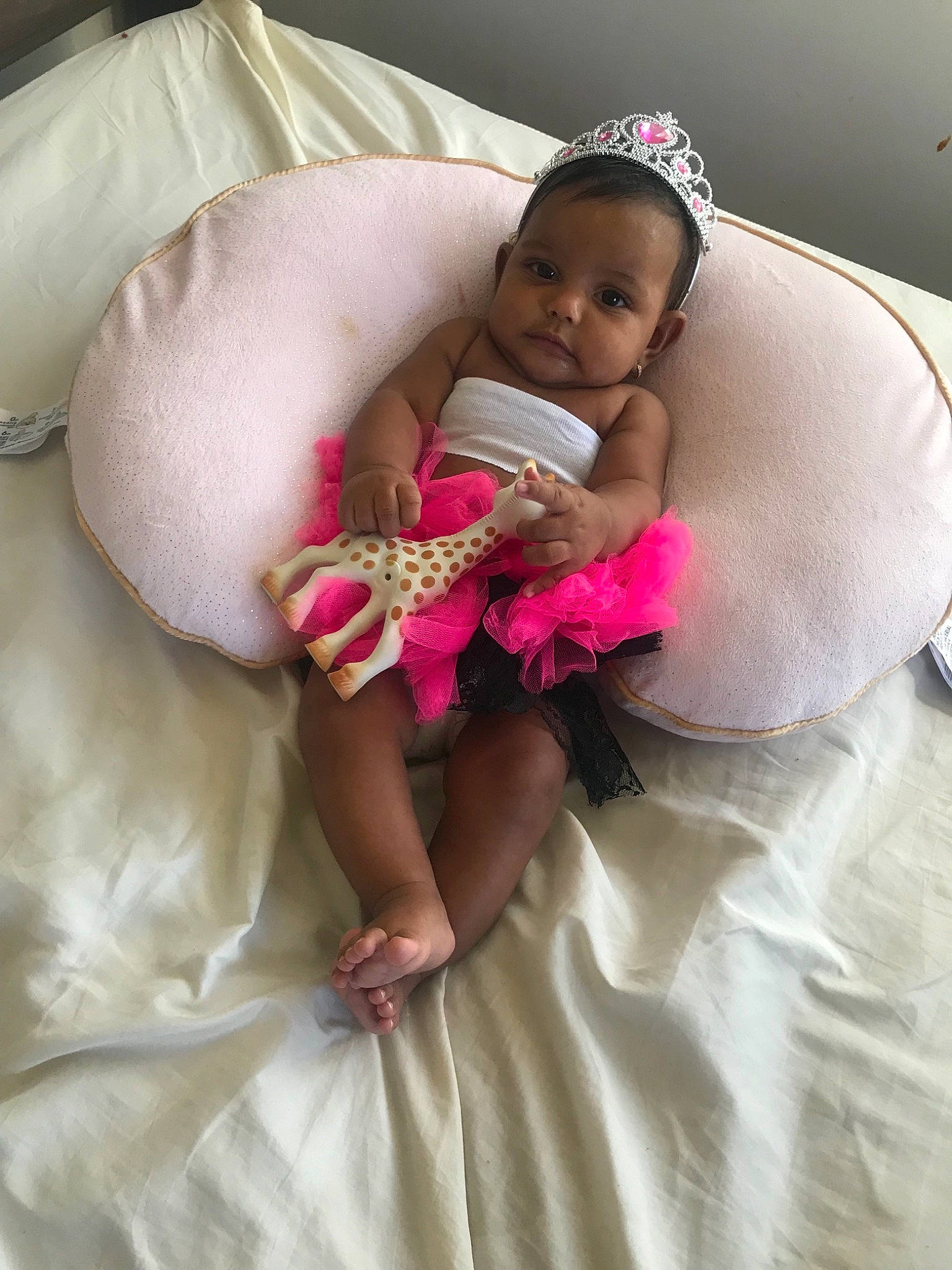 Alisha is registered to the contest to win money with this photo: baby, child, dress, hair_accessory, person, pink, skin, smile, textile, toddler, white