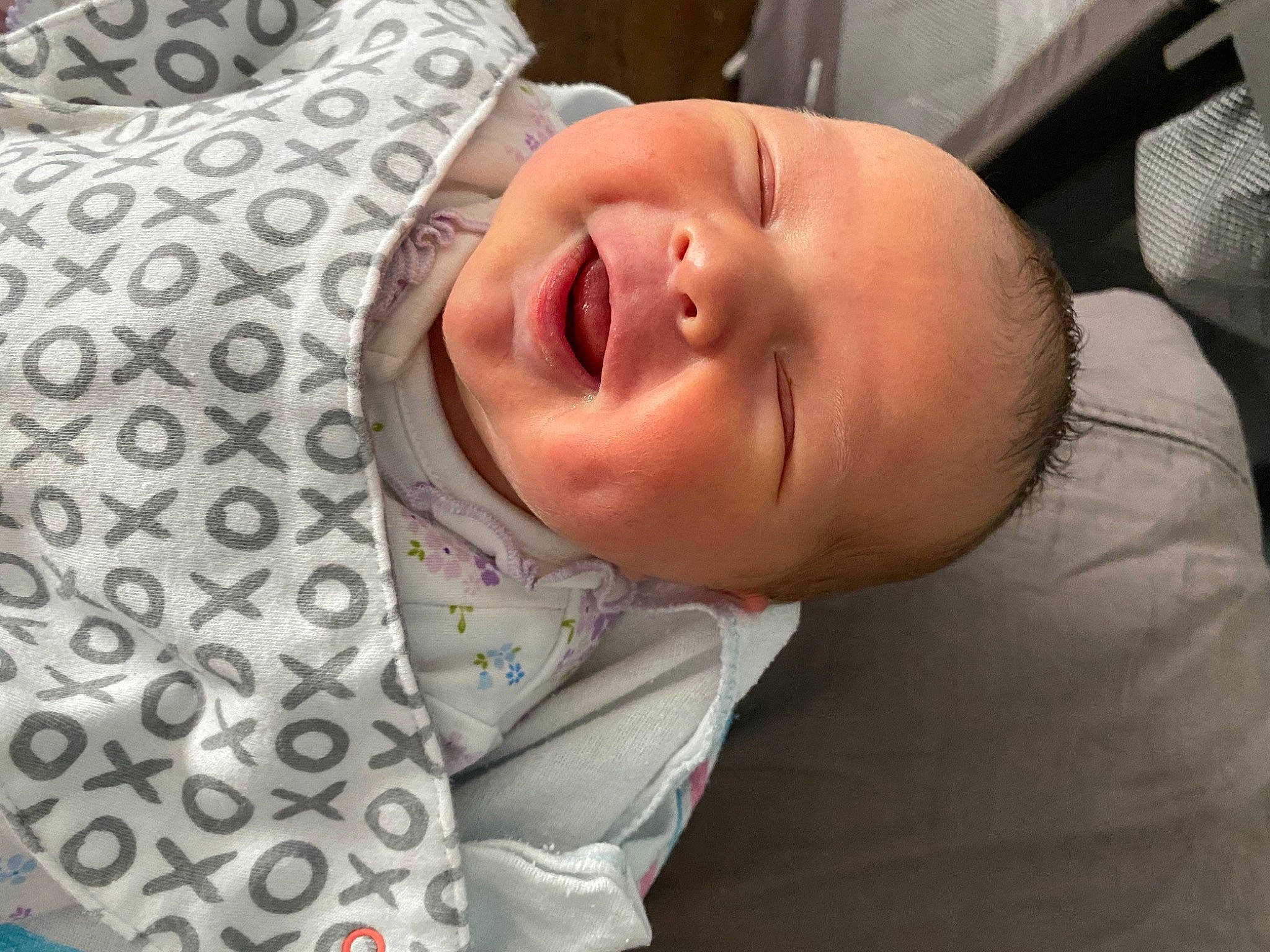 Harper is registered to the contest to win money with this photo: baby, baby_laughing, baby_products, baby_safety, baby_toddler_clothing, bedtime, cheek, child, comfort, fun, happy, iris, laugh, linens, nose, pattern, person, room, sleeve, smile