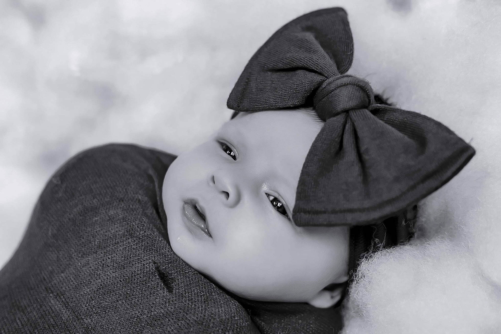 Harper is registered to the contest to win money with this photo: baby, cap, cloud, comfort, eyebrow, eyelash, fashion_accessory, flash_photography, freezing, fur, happy, hat, headwear, lip, monochrome, monochrome_photography, nose, outerwear, person, smile