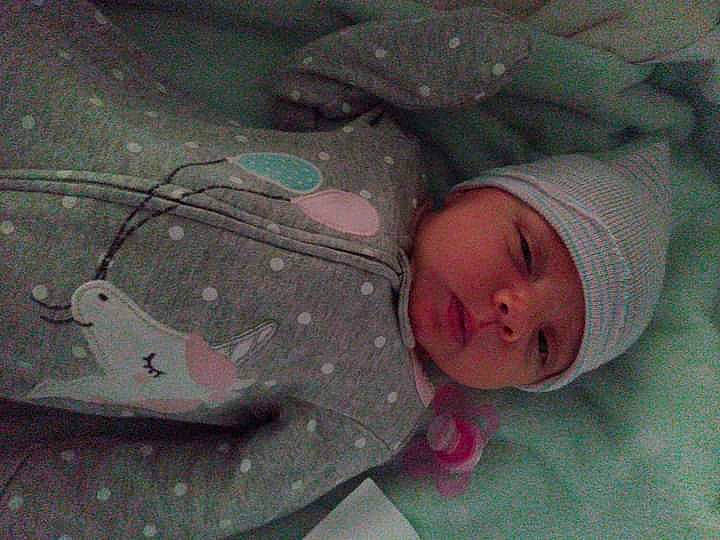 Laylah is registered to the contest to win money with this photo: baby, baby_products, baby_sleeping, baby_toddler_clothing, bedding, bedtime, carmine, child, comfort, headwear, linens, nap, pattern, person, product, room, sleep, sleeve, toddler