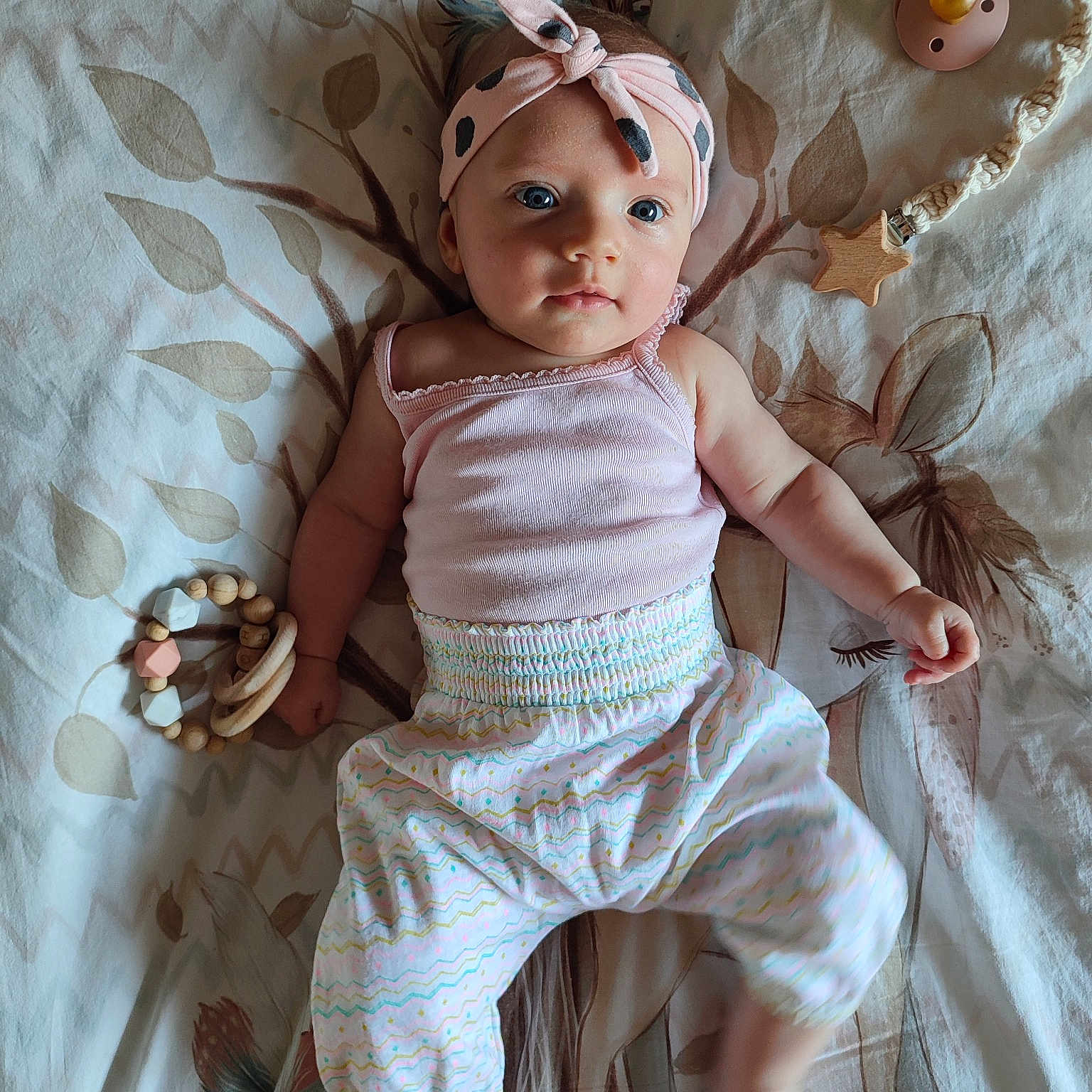 Hope participe au concours pour gagner de l'argent avec cette photo : abdomen, baby, baby_toddler_clothing, child, day_dress, fashion_accessory, fashion_design, happy, headband, headpiece, iris, linens, pattern, peach, pink, ruffle, skin, sleeve, toddler, waist