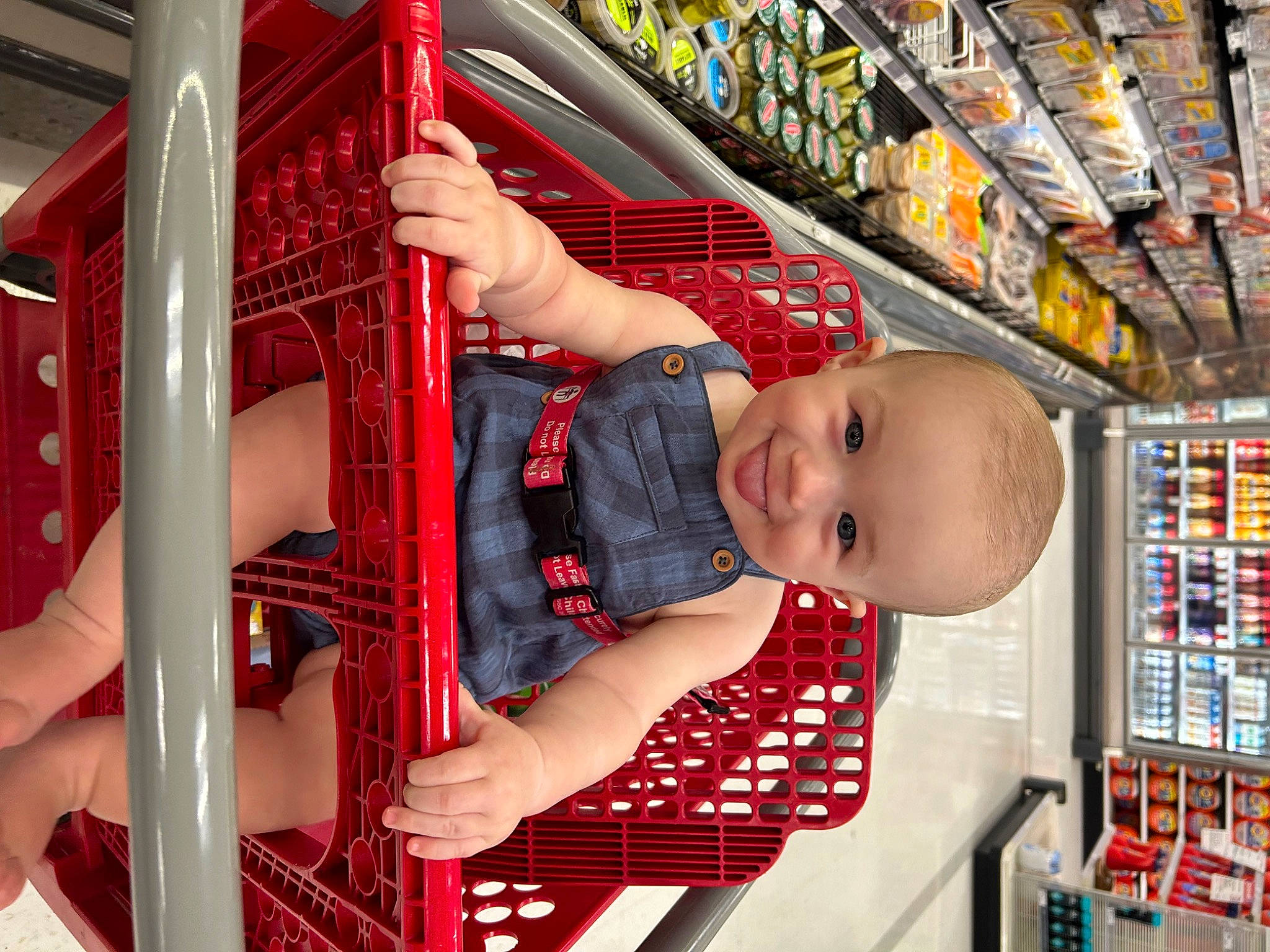 Jace is registered to the contest to win money with this photo: amusement_ride, baby, baby_products, baby_safety, baby_toddler_clothing, child, city, customer, fun, hat, joy, leisure, pattern, person, play, retail, shelf, smile, t_shirt, toddler