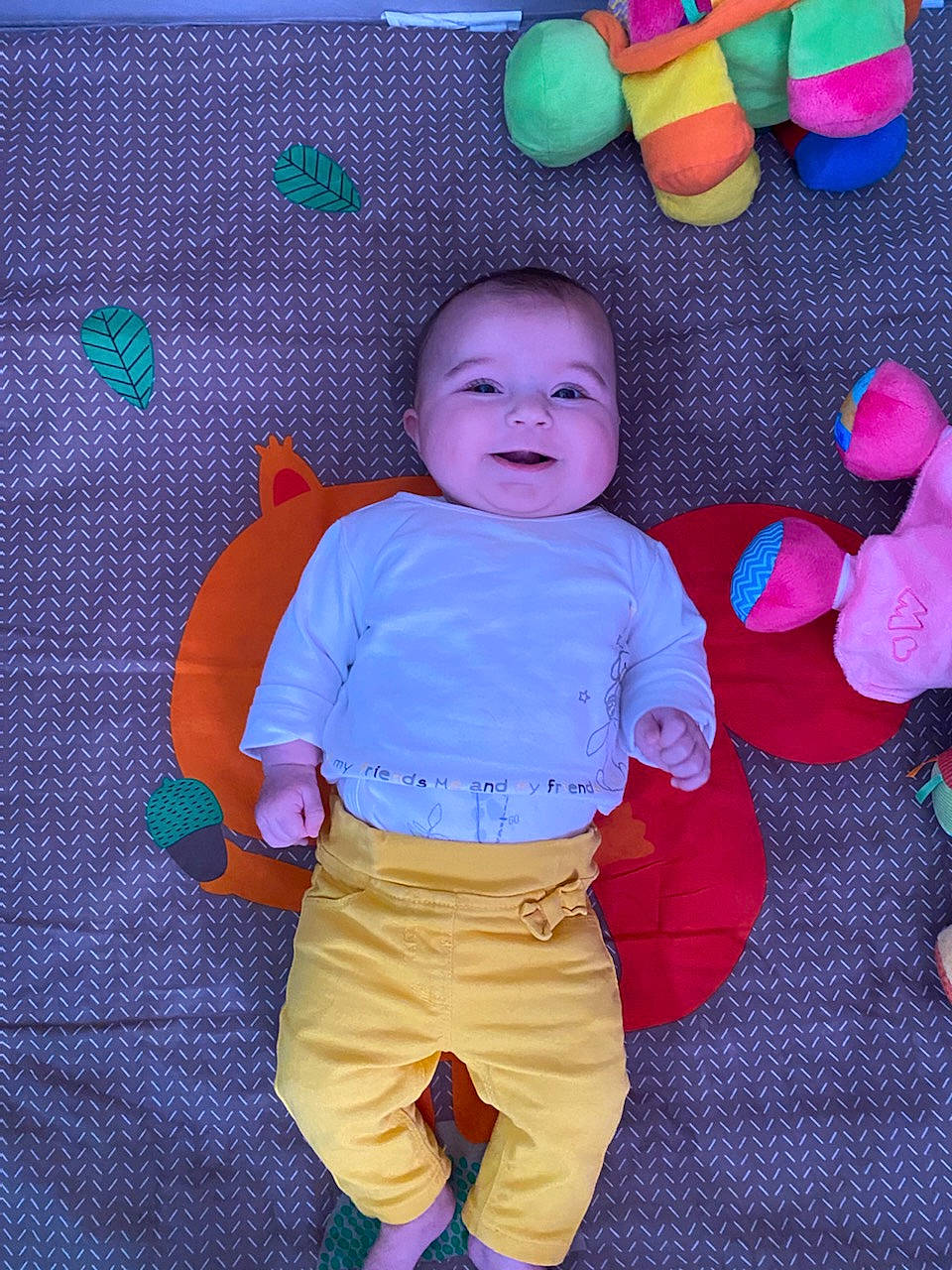 Carla participe au concours pour gagner de l'argent avec cette photo : baby, baby_playing_with_toys, baby_toddler_clothing, child, eye, facial_expression, fun, gesture, happy, head, headwear, magenta, person, pink, product, purple, sleeve, smile, stuffed_toy, textile