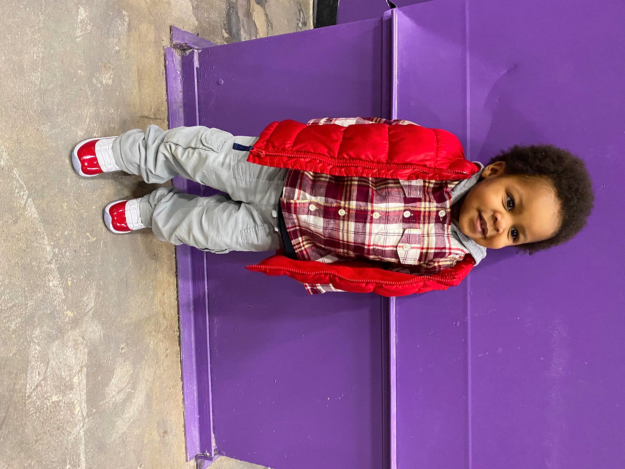 Makhy joined the competition — help win amazing prizes! baby_toddler_clothing, carmine, child, clothing, concrete, electric_blue, flooring, fun, magenta, pattern, person, personal_protective_equipment, pink, plaid, purple, red, sitting, sleeve, smile, tartan