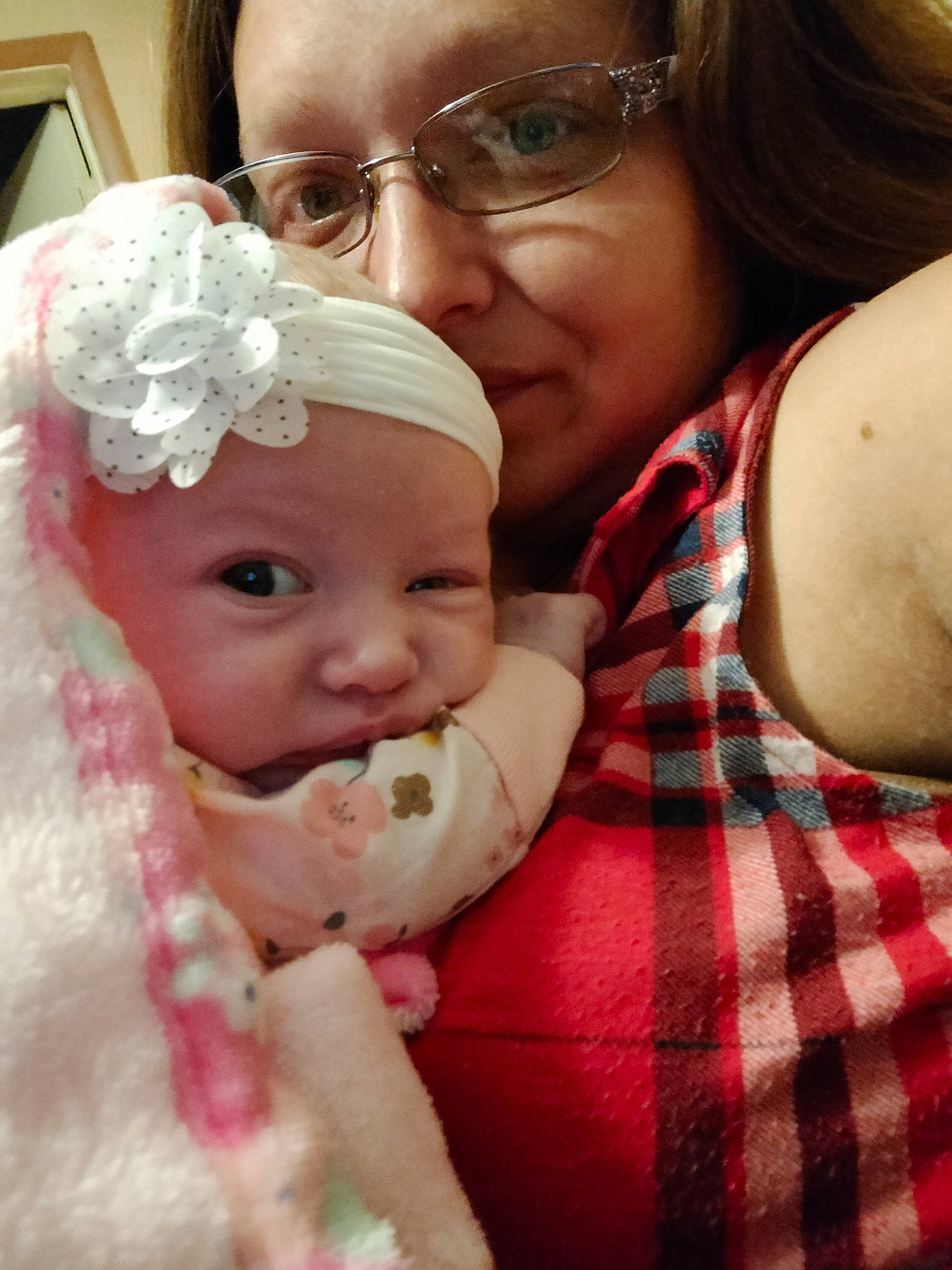 Katherine is registered to the contest to win money with this photo: baby, baby_toddler_clothing, cheek, ear, eye, face, facial_expression, fun, glasses, happy, head, headwear, interaction, iris, lip, mouth, nose, person, skin, smile