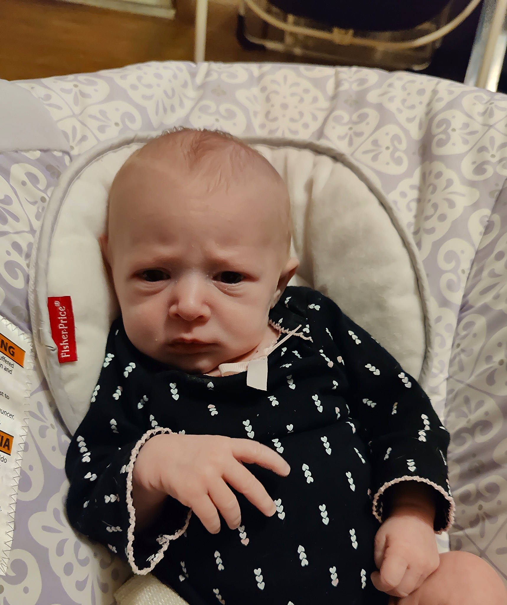 Katherine is registered to the contest to win money with this photo: baby, baby_products, baby_safety, baby_toddler_clothing, cheek, child, collar, comfort, eye, happy, iris, linens, pattern, person, portrait_photography, sitting, skin, sleeve, sorrow, t_shirt