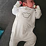 Zayne joined the competition — help win amazing prizes! baby, infant, onesie, pacifier, couch, gray, sleeping, child, indoor, clothing, cute, newborn, person, resting, soft, fabric, relaxed, small, peaceful, portrait