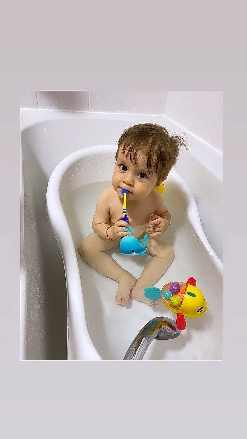 Adan joined the competition — help win amazing prizes! baby, baby_bathing, bath_toy, bathing, bathtub, child, person, play, plumbing_fixture, potty_training, product, room, rubber_ducky, toddler, toy