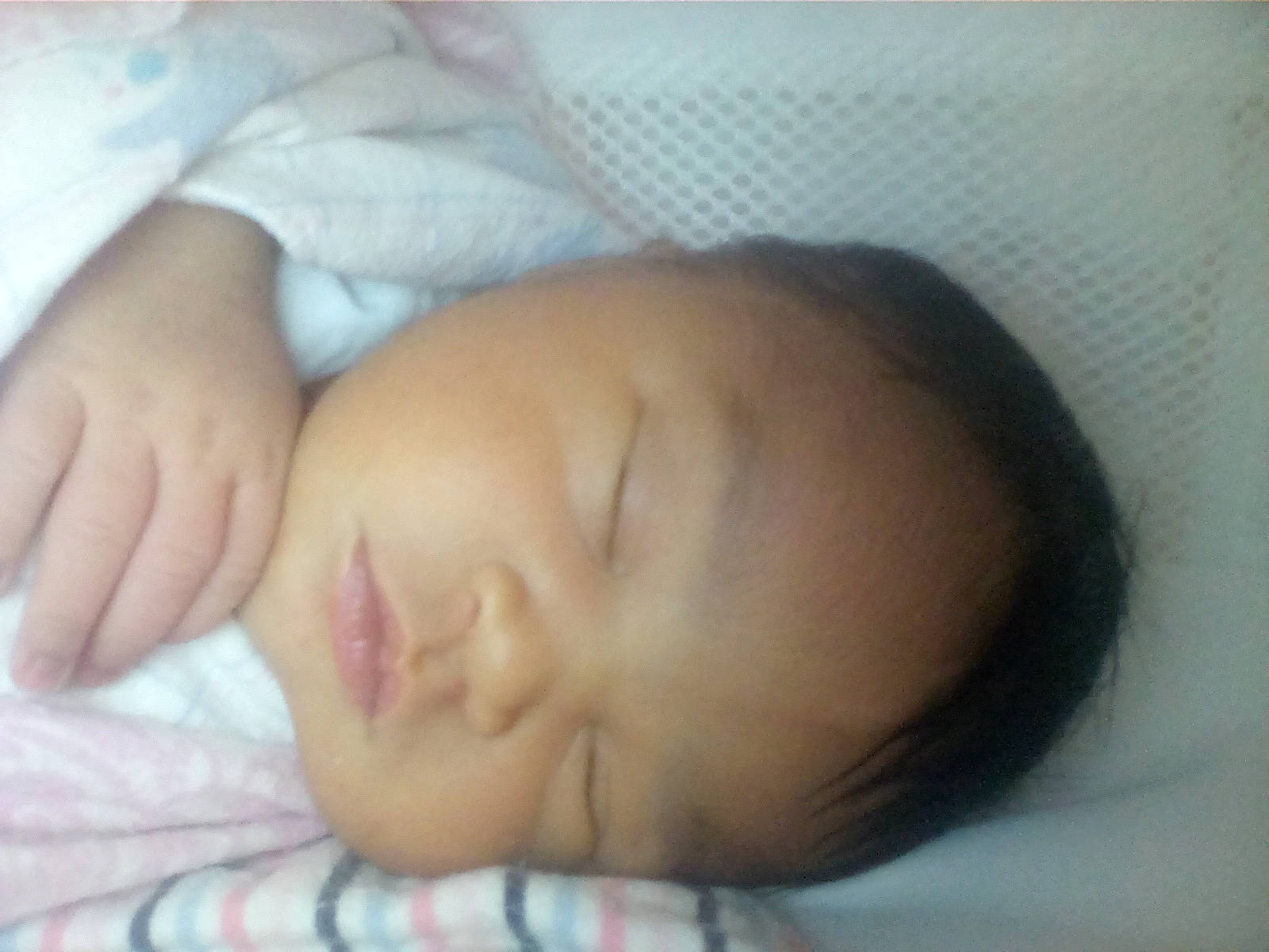 Janelle is registered to the contest to win money with this photo: baby, beauty, bedtime, cheek, child, chin, close_up, ear, eye, eyebrow, face, forehead, hair, head, lip, mouth, nap, nose, person, skin