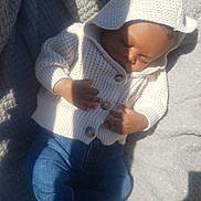 Clark Harris Jr joined the competition — help win amazing prizes! baby, sleeping, hoodie, knitted, jeans, socks, blanket, outdoor, sunlight, shadow, cozy, infant, peaceful, child, cute, relaxing, portrait, casual, warm, resting