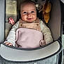Ruairi-Rae is registered to the contest to win money with this photo: baby, smile, blanket, stroller, pacifier, toy, plush, child, infant, clothing, face, happy, cute, comfort, portrait, warm, indoor, soft, baby_carriage, person