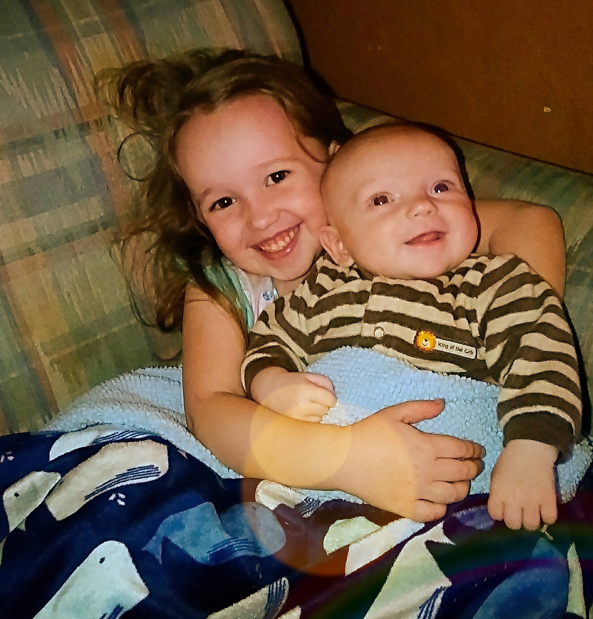 Alexzander joined the competition — help win amazing prizes! baby, cheek, child, electronic_device, eye, face, facial_expression, fun, happy, head, iris, joy, lap, leg, nose, people, person, sibling, sitting, skin