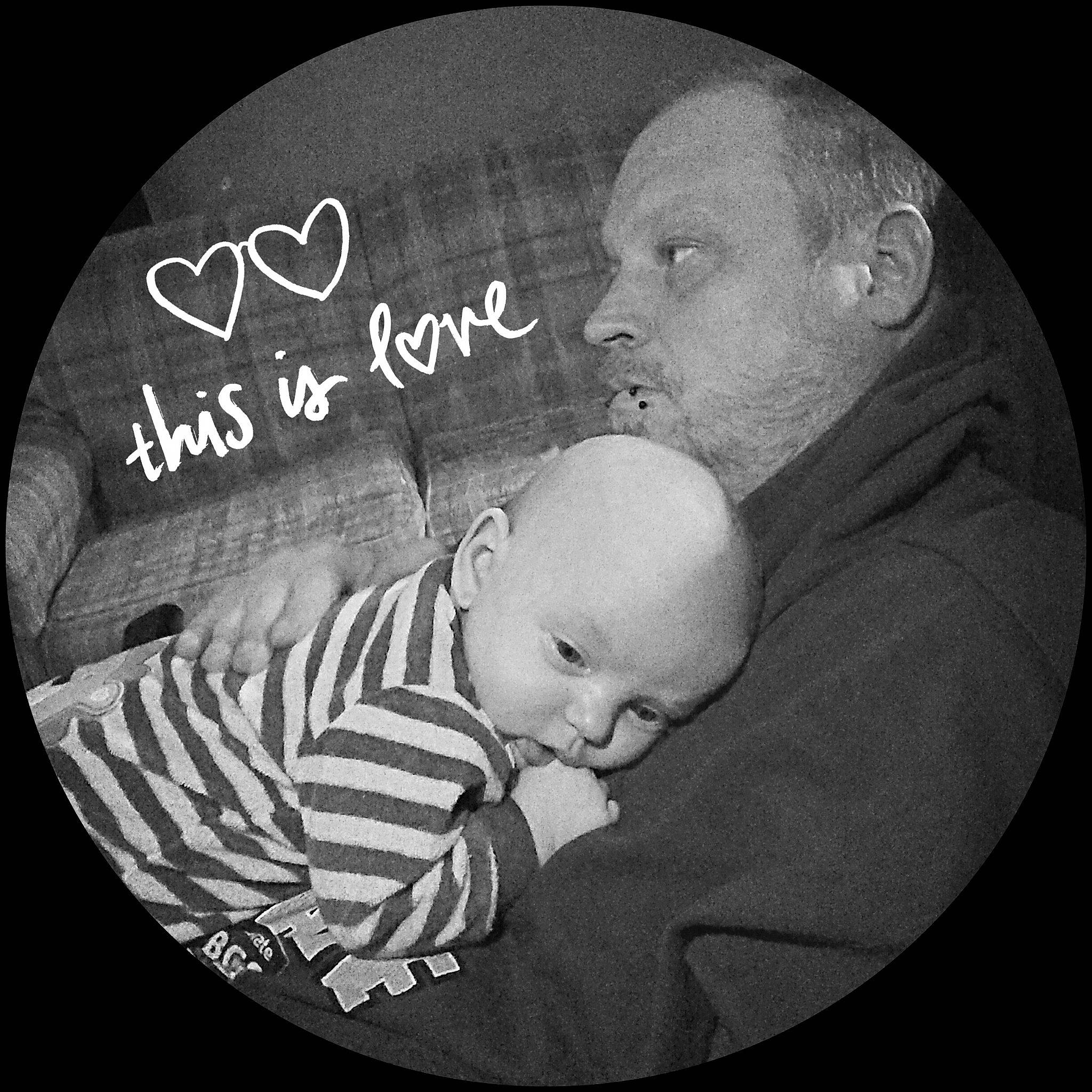 Alexzander is registered to the contest to win money with this photo: baby, black_and_white, child, circle, font, monochrome, monochrome_photography, person, photo_caption, photograph, photography, stock_photography