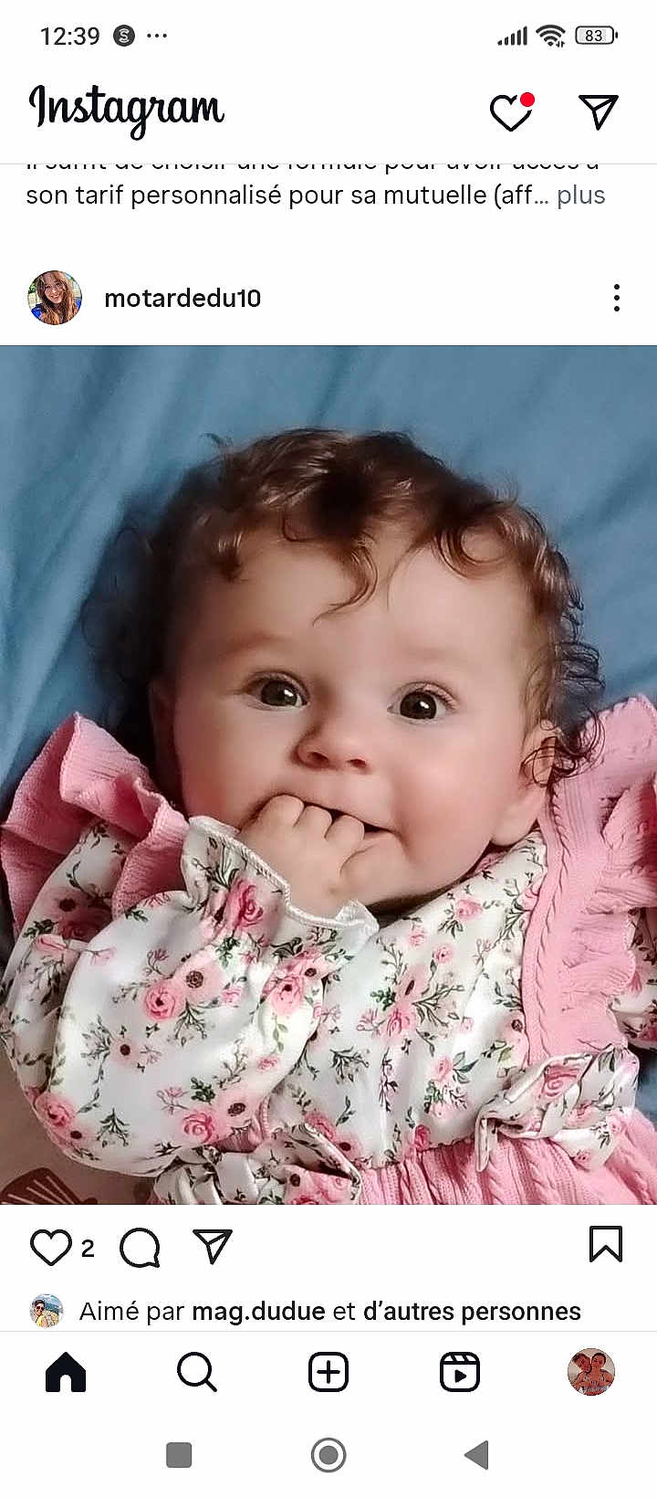 Noëly participe au concours pour gagner de l'argent avec cette photo : baby, child, curly_hair, face, fingers, floral_clothing, pink, portrait, cute, infant, lying_down, soft_texture, adorable, young_child, smiling_eyes, close_up, indoors, person, happy, toddler