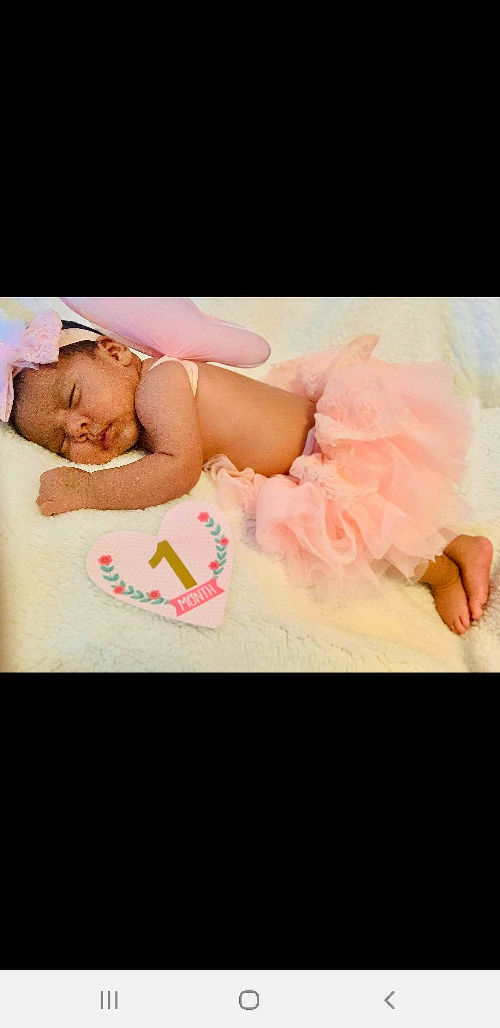 Amaya is registered to the contest to win money with this photo: baby, baby_sleeping, baby_toddler_clothing, child, comfort, fashion_accessory, flash_photography, flesh, font, happy, human_leg, linens, magenta, pattern, peach, person, petal, pink, sweetness, thigh