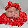 Vivian joined the competition — help win amazing prizes! newborn, baby, sleeping, red_clothing, headband, soft, blanket, infant, cute, peaceful, portrait, child, adorable, resting, closeup, indoors, white_background, velvet, small, cozy