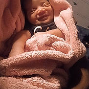 Aleyah joined the competition — help win amazing prizes! baby, blanket, smile, infant, cozy, pink, soft, wrapped, sleepy, cute, child, face, happy, indoor, portrait, newborn, resting, comfort, warmth, toddler