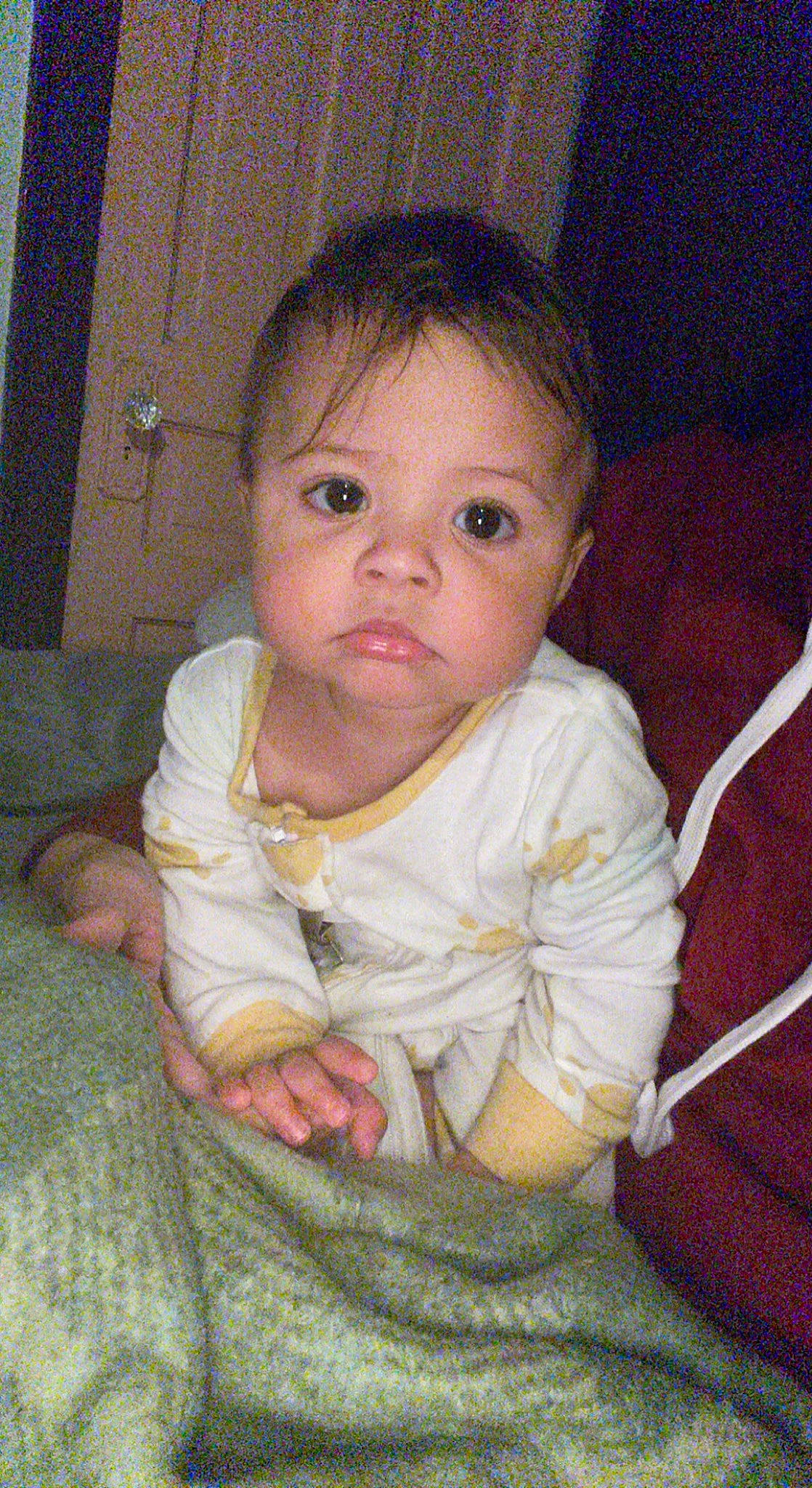 Braelyn is registered to the contest to win money with this photo: baby, baby_products, baby_toddler_clothing, cheek, comfort, eyebrow, face, finger, flooring, fun, head, human_body, iris, lip, mouth, nose, person, skin, sleeve, thumb